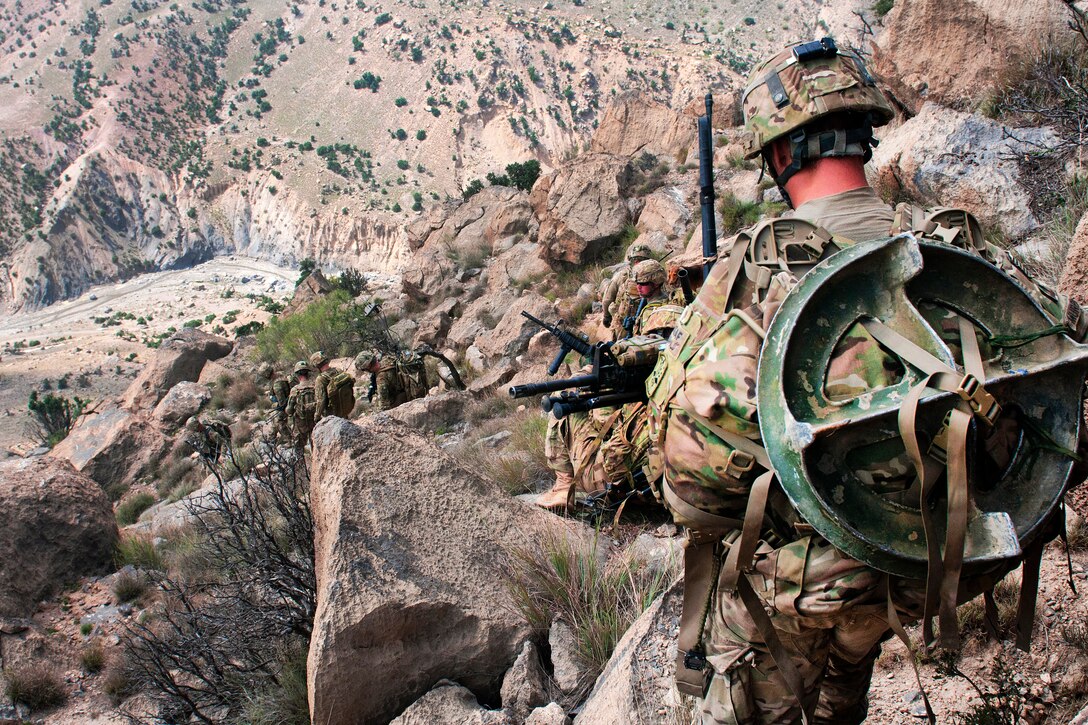U.S. troops begin their descent off of "Big Nasty," a mountain near Forward Operating Base Tillman in Paktika province, Afghanistan, Sept. 7, 2011.