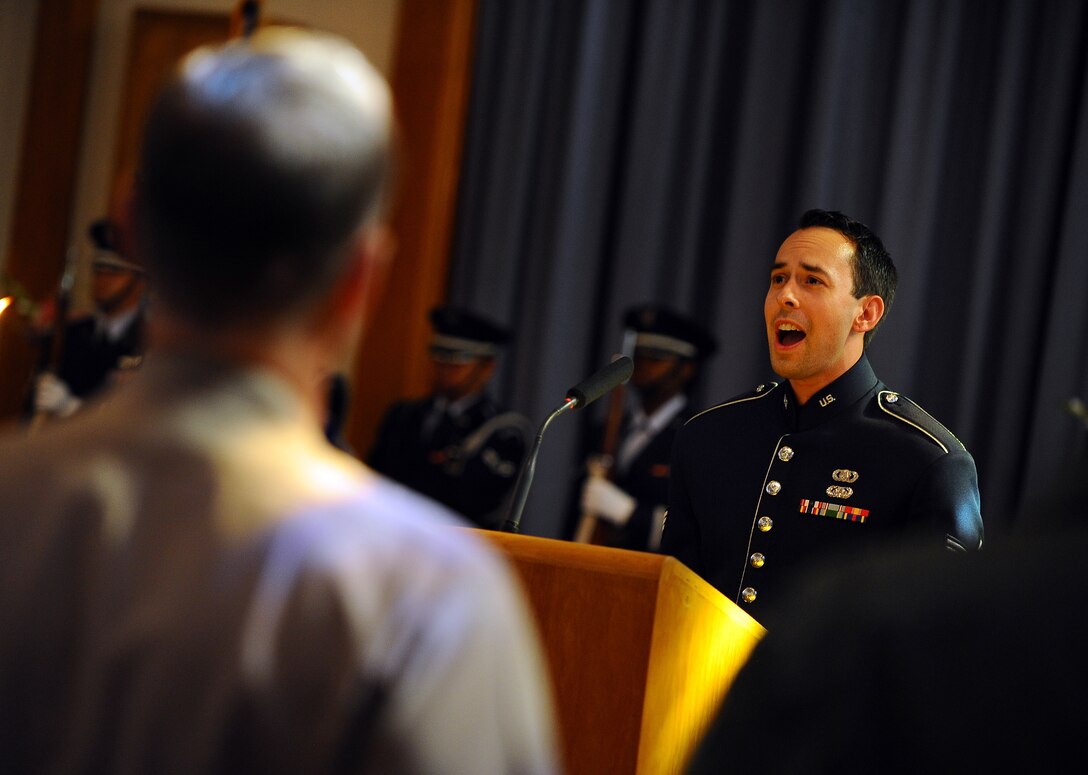 Senior Airman Devin C. Rivas-Martin, a vocalist with the Heartland of America Band, sings the National Anthem during the 9-11 Memorial Service of Remembrance and Hope at the SAC Chapel located at Offutt Air Force Base, Sept. 9.  Air Force Chaplains gave words of hope and comfort to those in attendance, to include those who lost family members in Afghanistan and Iraq. (U.S. Air Force Photo by Josh Plueger/released)