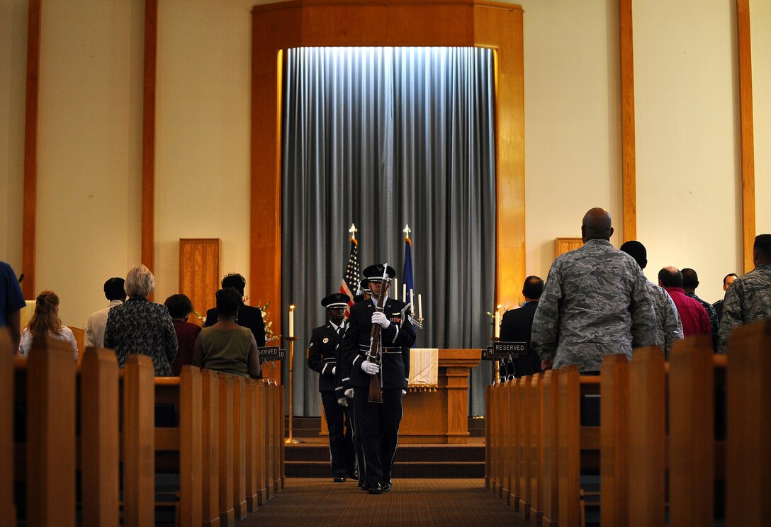 The Offutt Air Force Base Honor Guard leaves the SAC Chapel, located at Offutt Air Force Base, following the posting of the colors to begin the 9-11 Memorial Service of Remembrance and Hope, Sept. 9.  Offutt played a crucial role in the events of the 9-11 attacks. (U.S. Air Force Photo by Josh Plueger/released)
