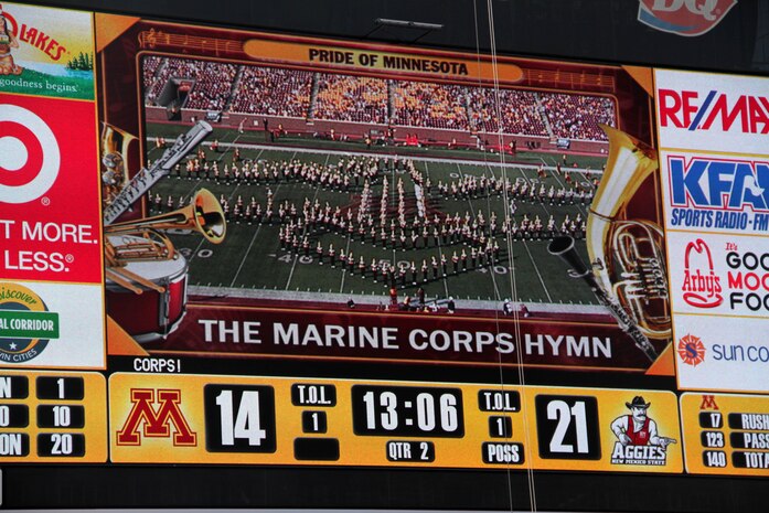 The University of Minnesota Marching Band performs the Marines' Hymn during the Gophers halftime show at TCF Bank Stadium Sept. 10. Following the musical performance, three lieutenants from Marine Corps Officer Selection Station Twins Cities reaffirmed their oath of office. For additional imagery from the event, visit www.facebook.com/rstwincities.