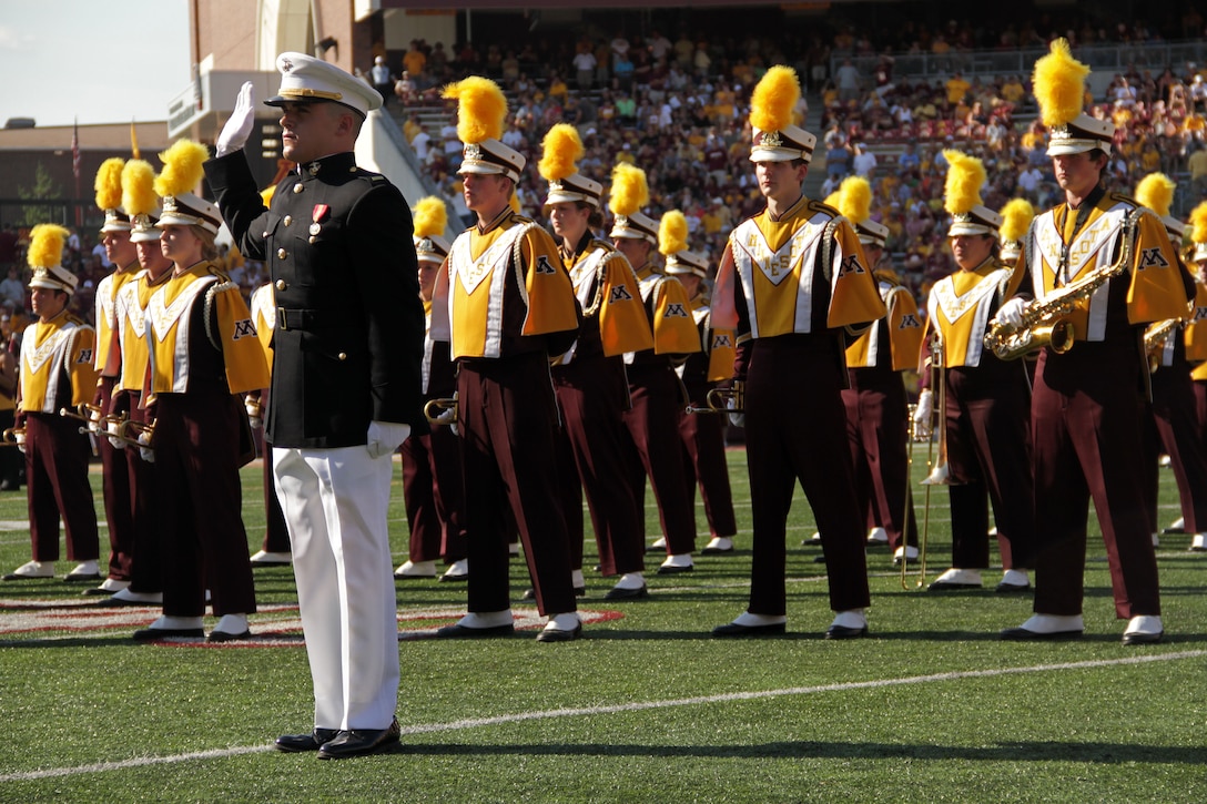 2nd Lt. Nathan R. Van Otterloo, a 22-year-old St. Peter, Minn., native who reports to "The Basic School" on Oct. 18, reaffirms his oath of office during the Minnesota Gophers halftime show at TCF Bank Stadium Sept. 10. Van Otterloo graduated from the University of Minnesota last year. For additional imagery from the event, visit www.facebook.com/rstwincities.