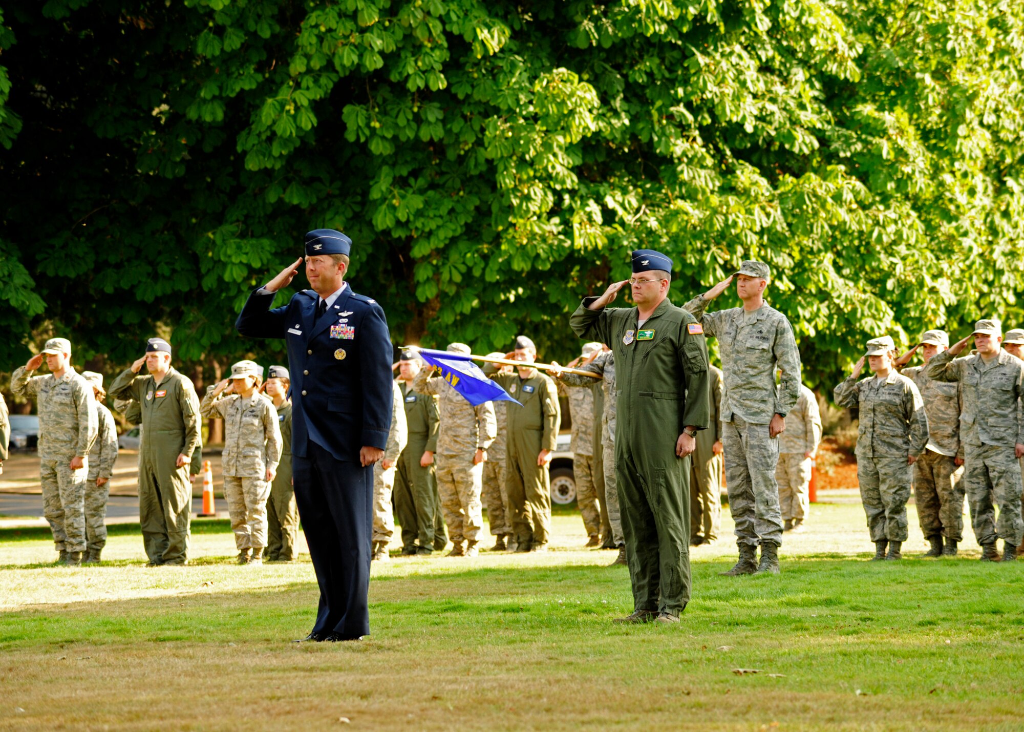 62nd Airlift Wing leadership salutes the American flag Sept. 9 during the final McChord Field Retreat ceremony of 2011 at Joint Base Lewis-McChord, Wash. (U.S. Air Force photo/Adamarie Lewis-Page)