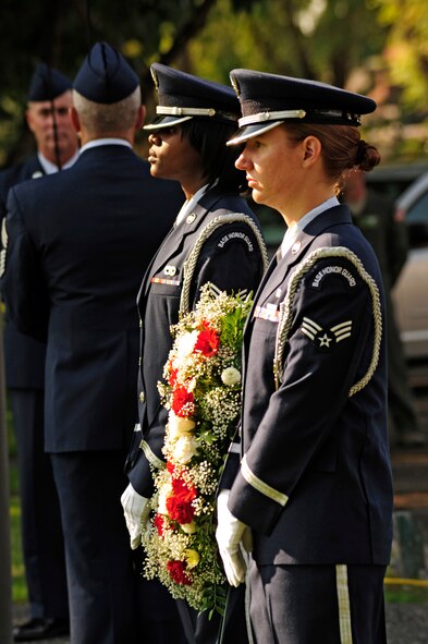 Two Honor Guard Airmen participate Sept. 9  during the final McChord Field Retreat ceremony of 2011 at Joint Base Lewis-McChord, Wash. (U.S. Air Force photo/Adamarie Lewis-Page)
