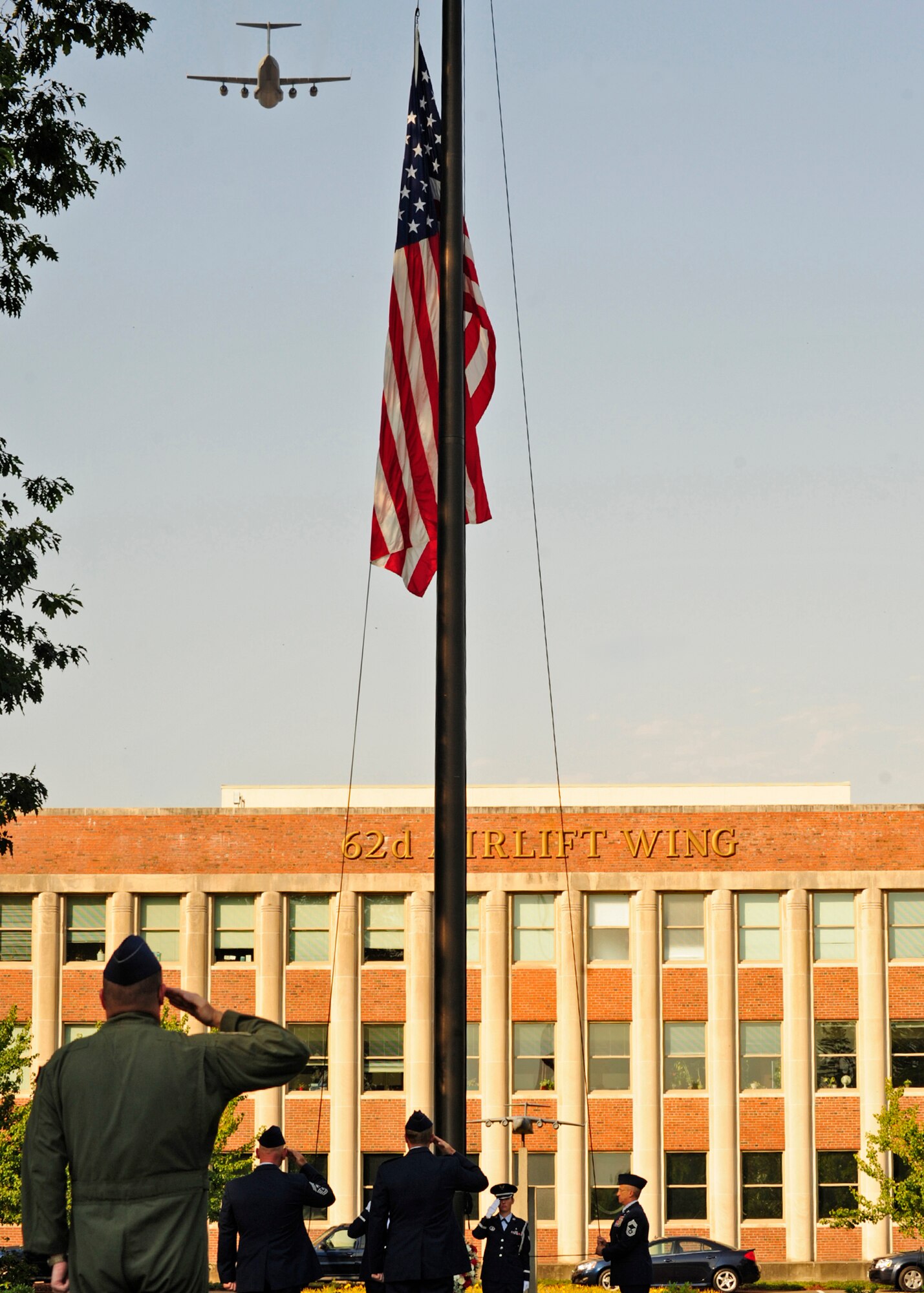 McChord Field leadership salute the American flag Sept. 9 during the final McChord Field  Retreat ceremony of 2011 at Joint Base Lewis-McChord, Wash. (U.S. Air Force photo/Adamarie Lewis-Page)