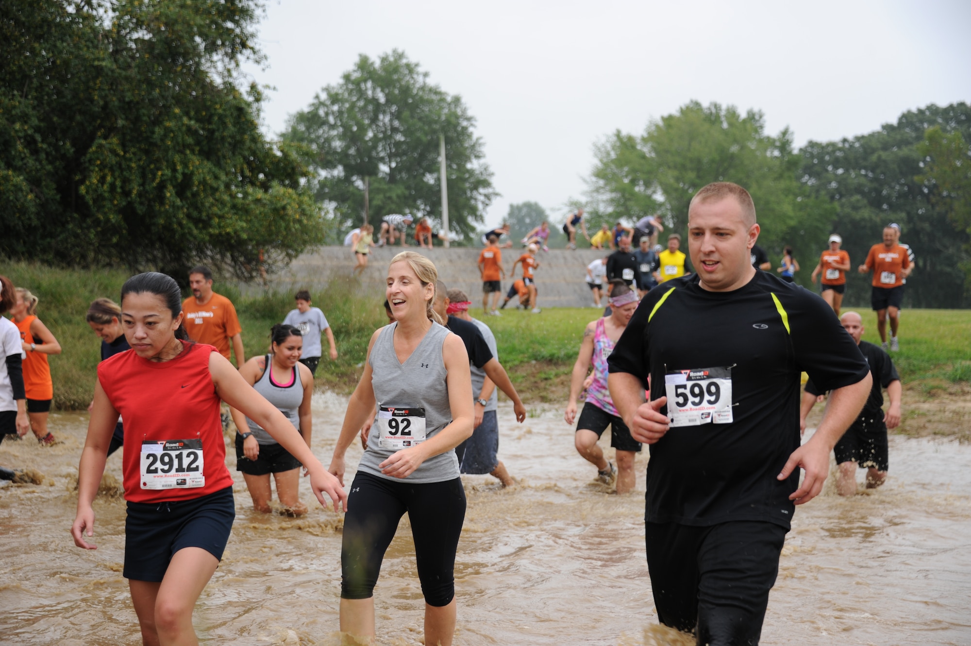 Joint Base McGuire-Dix-Lakehurst opened its doors to more than 3,400 athletes and athlete 'wanna-bes' who had the mettle to face the arduous 10k obstacle course known as the infamous 'Beast of the East.' The first group departed the mud run starting line at 9 a.m. Sept. 10 at Doughboy Field here, with the last participants crossing the finish line well after noon. (U.S. Air Force photo by Airman 1st Class Dennis Sloan /released)
