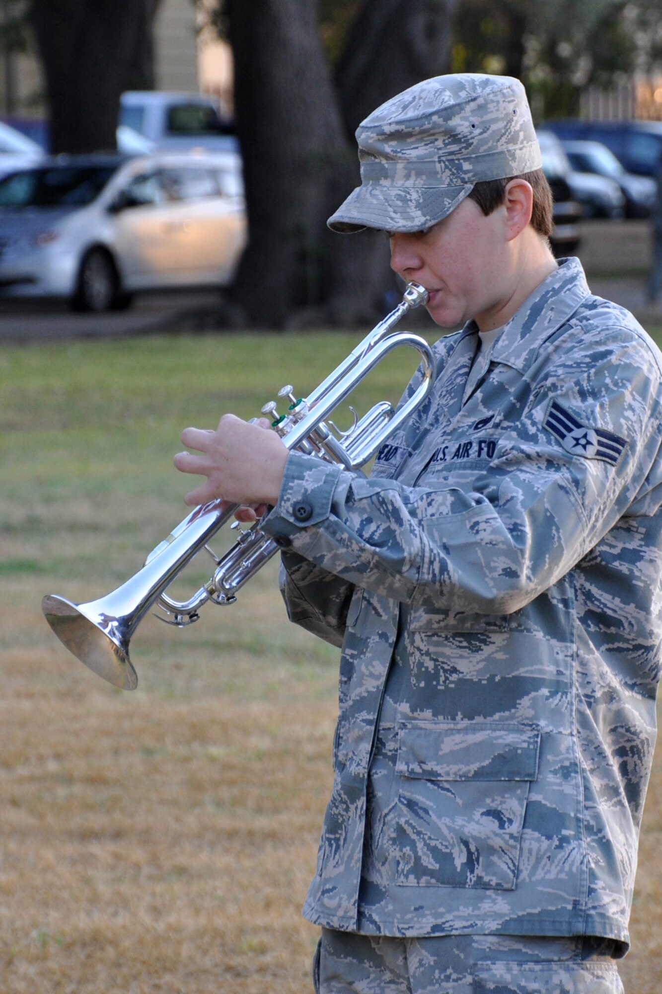 Senior Airman Heather Leithead, an aerospace ground equipment technician assigned to the 2nd Maintenance Squadron, prepares her trumpet for the playing of taps at the 9/11 Remembrance Ceremony at Barksdale Air Force Base, La., Sept. 9, 2011. Leithead, who hails from Corpus Christie, Texas, has been playing the trumpet since she was 11 years old. (U.S. Air Force photo by Tech. Sgt. Jeff Walston/Released)