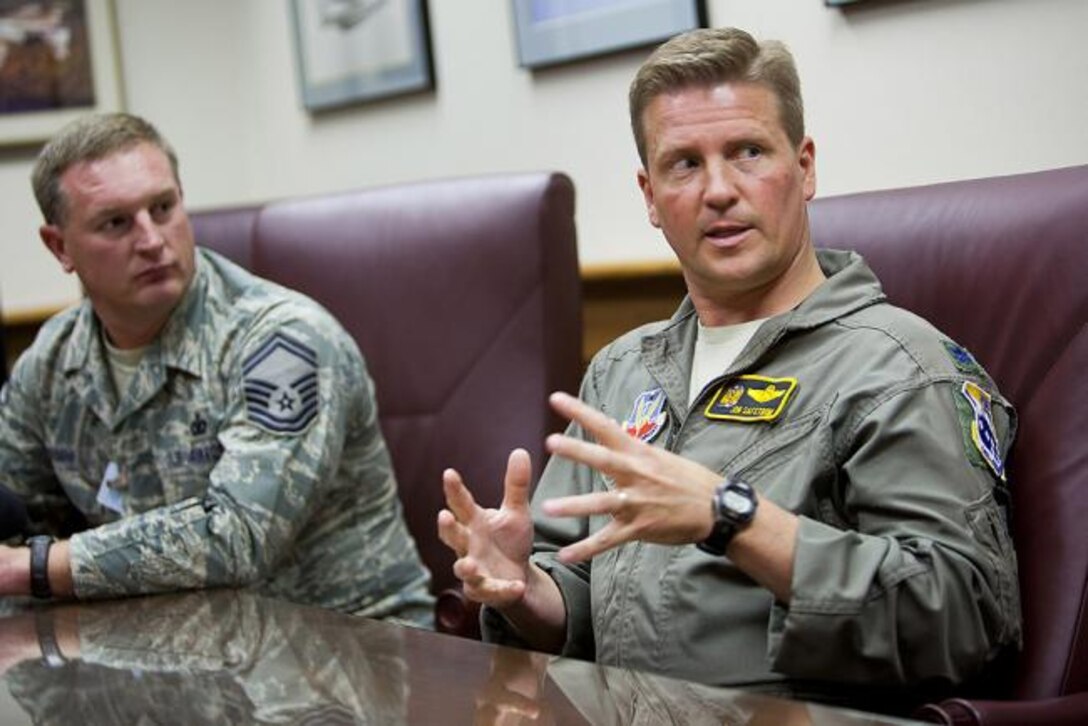 Lt. Col. Jon Safstrom (right), 148th Fighter Wing Vice Commander, talks about the upcoming 10th anniversary of 9/11, the events of that day and how it has changed the military, Wednesday, Sept. 7, 2011, at the 148th Fighter Wing in Duluth, Minn. Next to Lt. Col. Safstrom is Sr. Master Sgt Pete Neumann (left). (MPR Photo/Derek Montgomery)