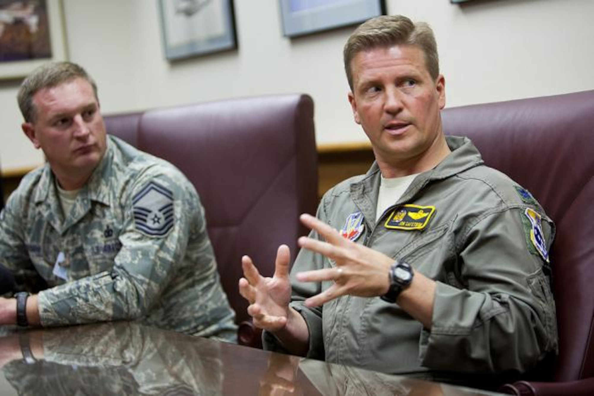 Lt. Col. Jon Safstrom (right), 148th Fighter Wing Vice Commander, talks about the upcoming 10th anniversary of 9/11, the events of that day and how it has changed the military, Wednesday, Sept. 7, 2011, at the 148th Fighter Wing in Duluth, Minn. Next to Lt. Col. Safstrom is Sr. Master Sgt Pete Neumann (left). (MPR Photo/Derek Montgomery)