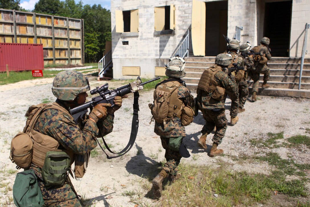 Marines with Bravo Company, 1st Battalion, 2nd Marine Regiment, conduct military operations in urban terrain training at the urban assault course on Fort Pickett, Va., Sept. 10, 2011. More than 900 Marines and sailors will take part in the deployment for training exercise at Fort Pickett, Sept. 6-23. The battalion is scheduled to attach to the 24th Marine Expeditionary Unit a few days after the training.