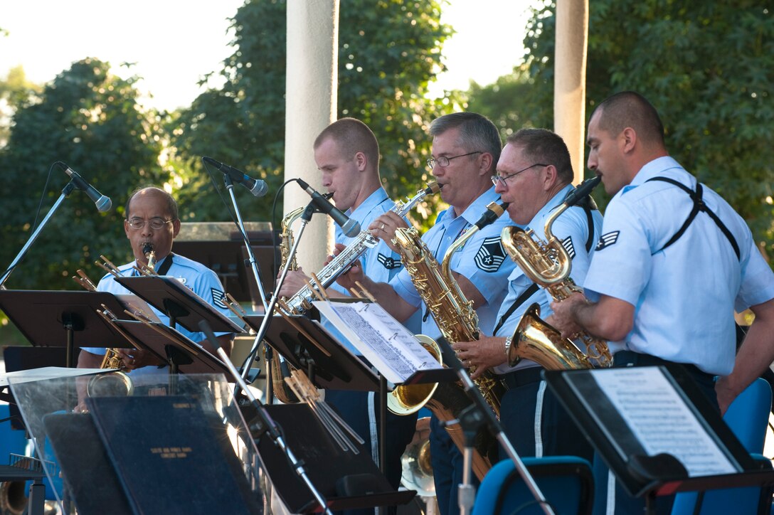 Members of the Air National Guard Band of the Southwest Saxophone Quintet perform some pre-concert music for the "Early Birds" in the audience. From left to right are: TSgt George Carganilla, new recruit A1C Kyle Shields, SMSgt Jurgen Schwarze, TSgt Jeff Zelinka, and SrA Jose Fausto. 

Photo by TSgt Chuck Hatton