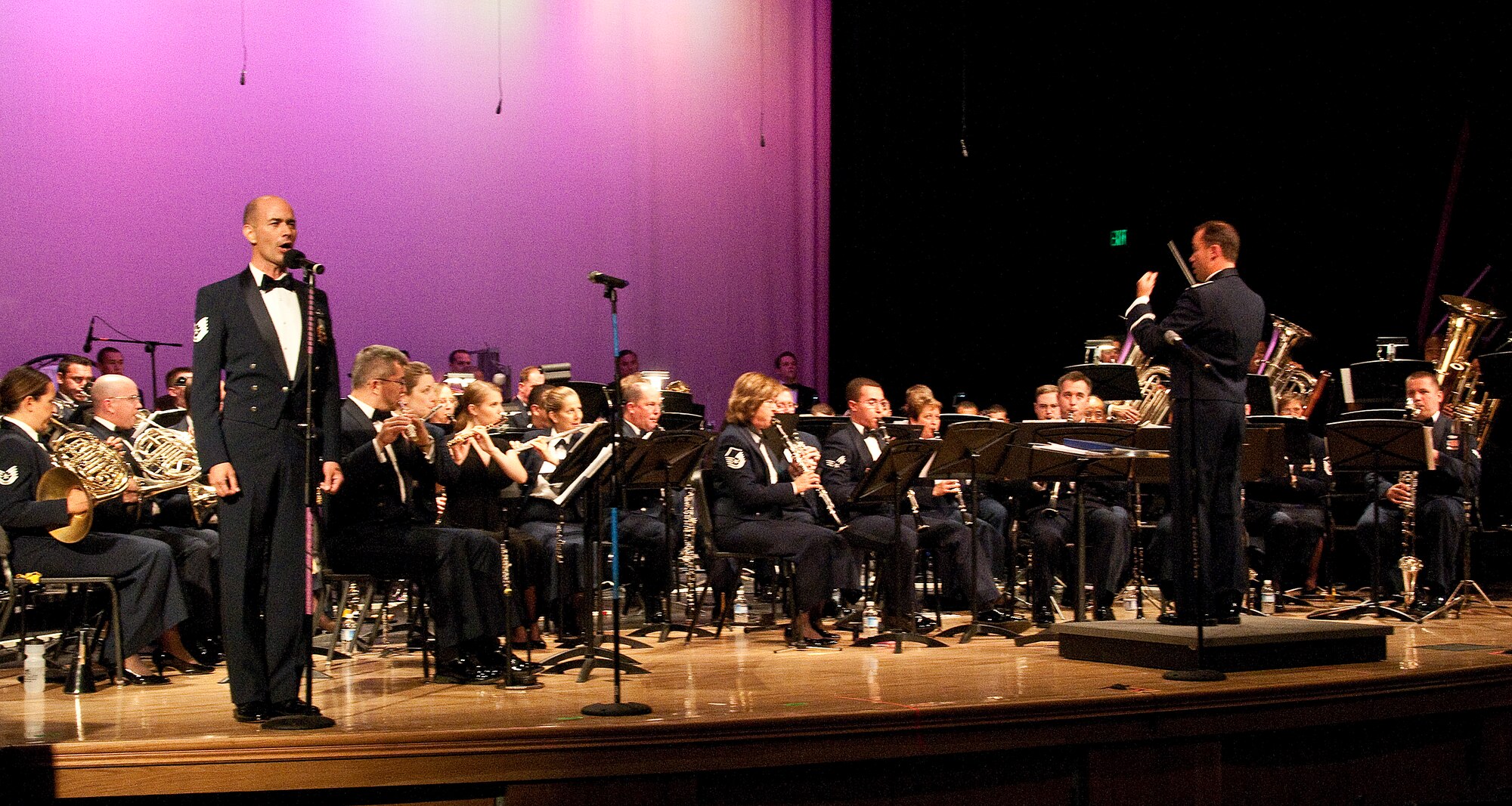 After completing the recording seesions for "Flag of Stars" the two Air National Guard Bands of Calfornia performed the music at Pacifica High School, Oxnard CA for a debut public performance. TSgt Daniel Plaster, an Operatic Tenor, performs an original arrangment of "Ch'ella Mi Creda Libero Lontano"  by SSgt Brian Hollett -  truly unique element of the 562 Air Force Band. 