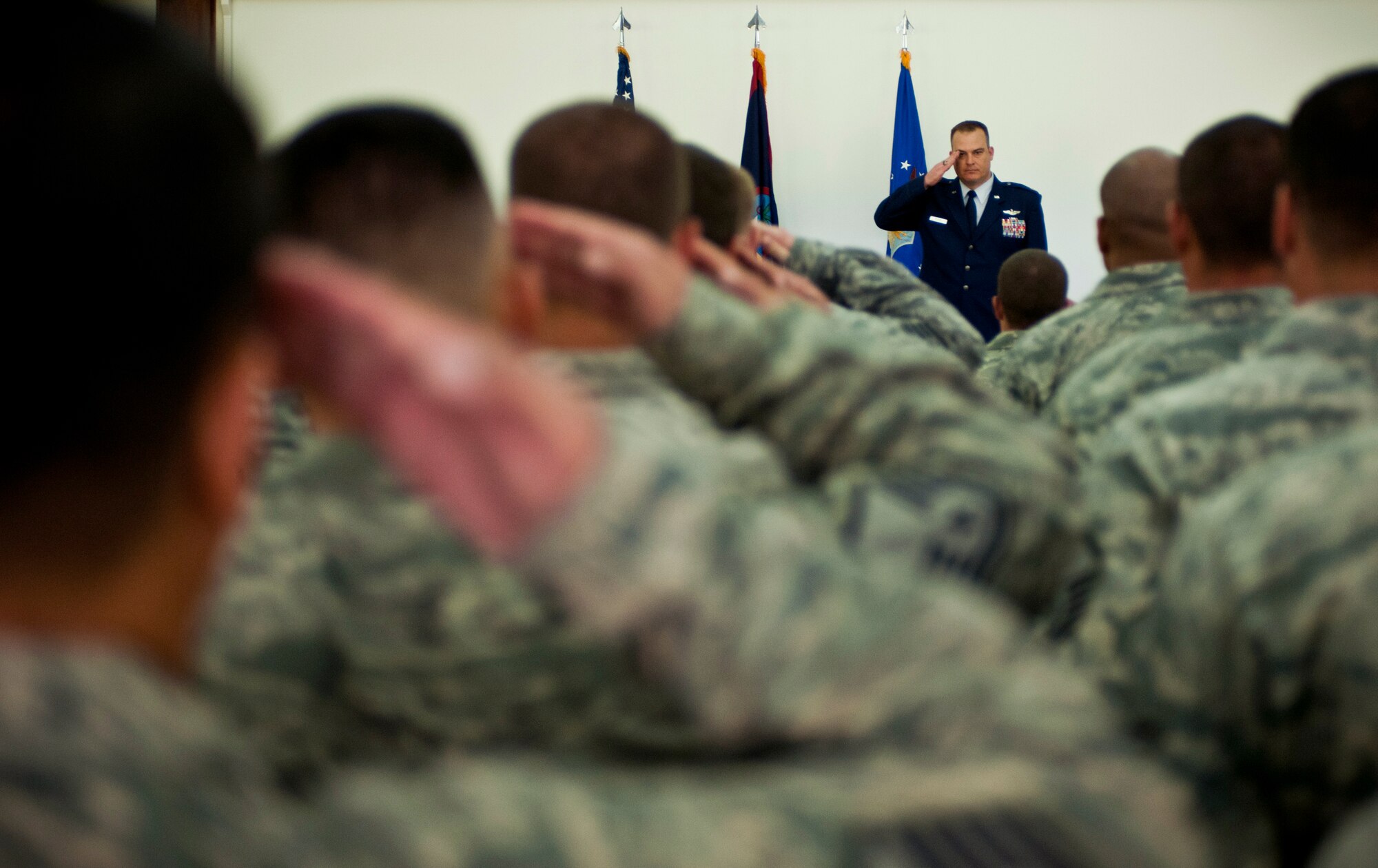 ANDERSEN AIR FORCE BASE, Guam— Lt. Col. Michael Black, 36th Mobility Response Squadron commander, is given a first salute from his troops during the 36th MRS change of command ceremony held at the Sunrise Conference Center here Sep. 7. Each incoming commander is given a first salute after receiving command of the unit. (U.S. Air Force photo by Senior Airman Benjamin Wiseman/Released)