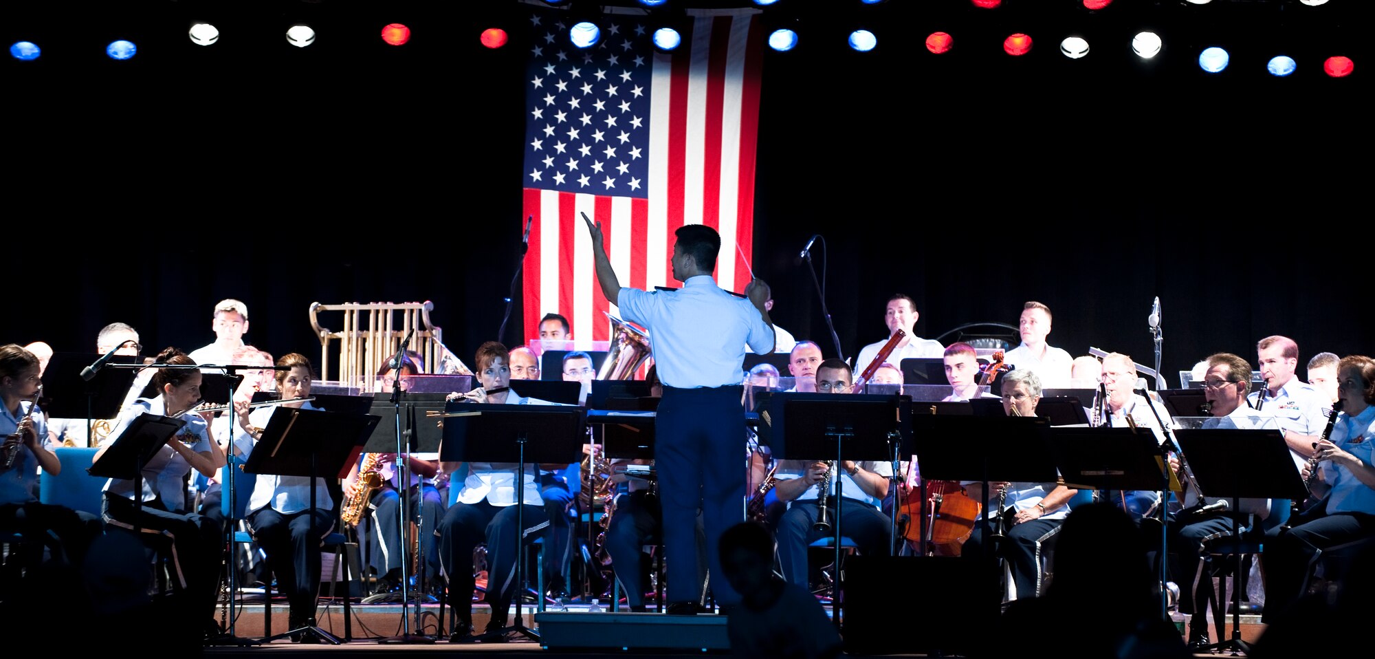 Captain Nguyen, Commander of the 561st AF Band, conducts an evening concert in Camarillo, CA  July 9 2011 of the combined 562nd and 531st Air National Guard Bands. This was the first concert in a series of concerts in the Soutern California Coast area. 
Photo by TSgt Chuck Hutton