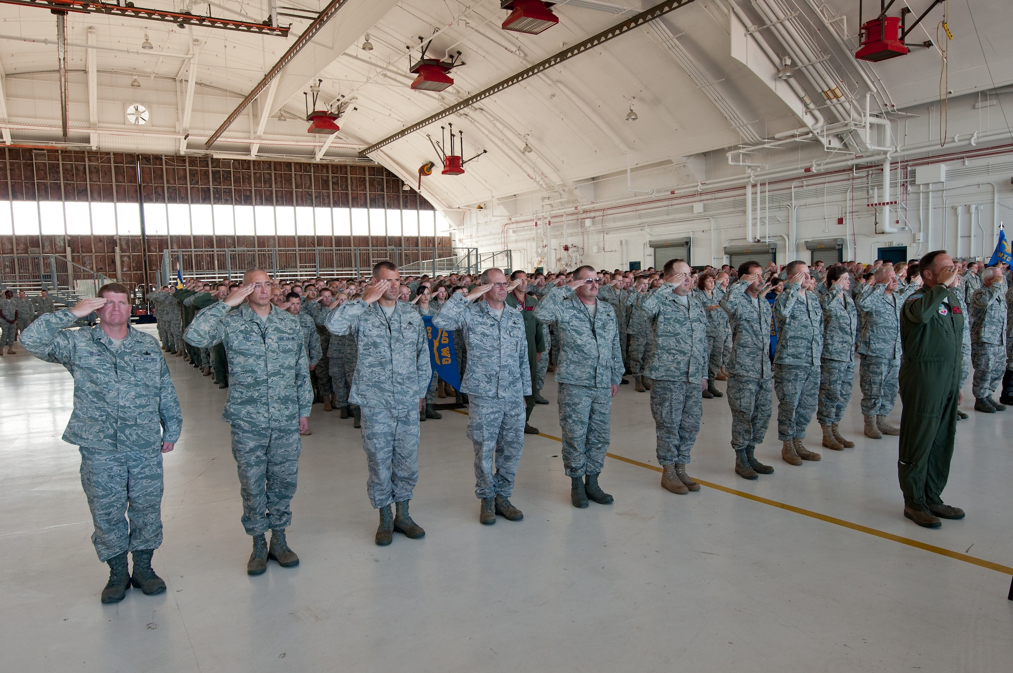 Members of team Buckely's 140th Wing, Colorado Air National Guard give a 'first salute' to their new commander, Brig. Gen. Richard L. Martin during a promotion and change of command ceremony Sept. 10. (U.S. Air Force photo/Master Sgt. John Nimmo, Sr.)