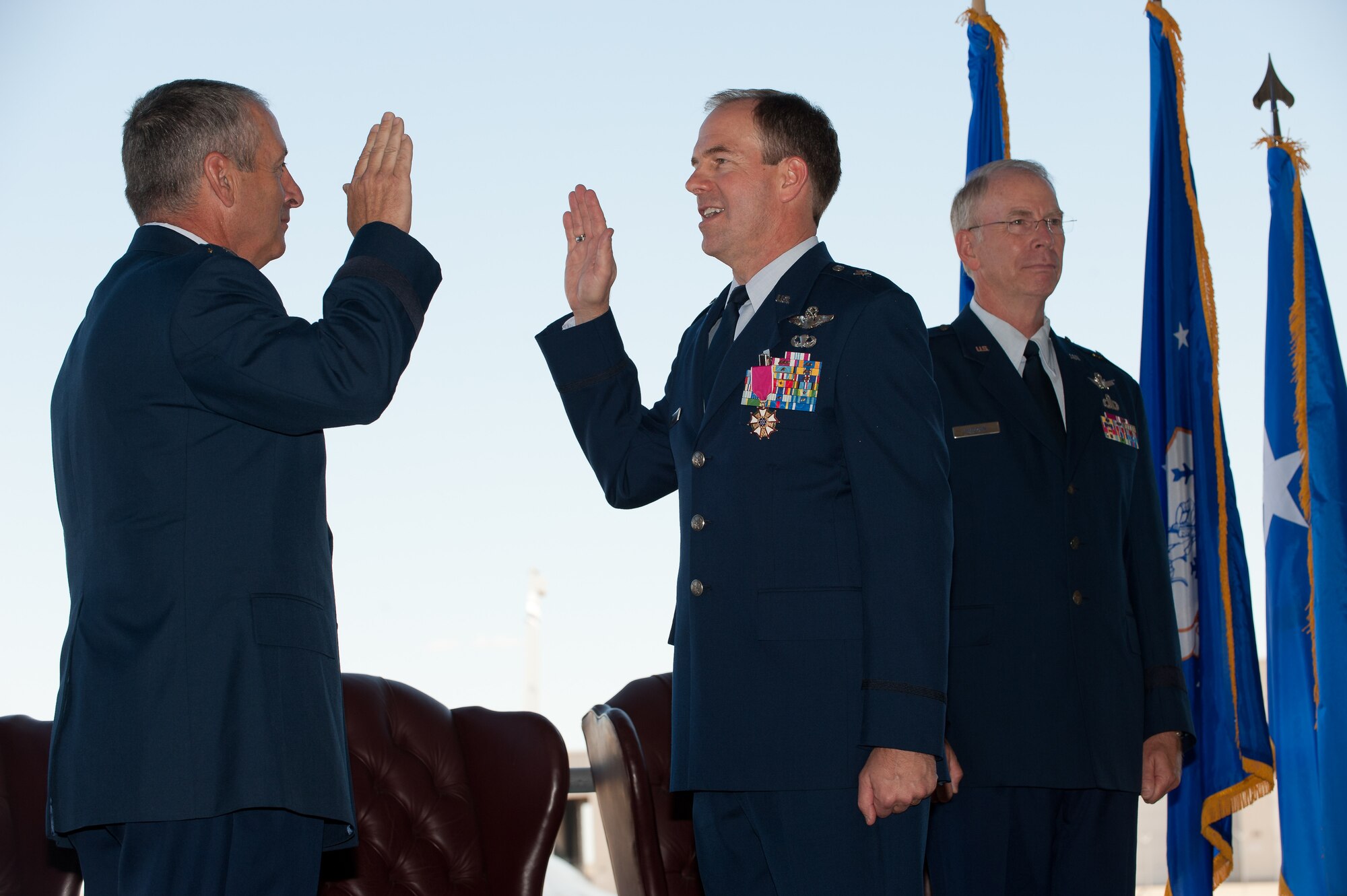 The Adjutant General of Colorado Maj. Gen. H. Michael Edwards administers the Oath of Office to Brig. Gen. Richard L. Martin Sept. 10. Martin is assuming command of the Colorado Air National Guard and the position of Assistant Adjutant General - Air. He is the former Director of Operations for the Colorado Air National Guard. (U.S. Air Force photo/Master Sgt. John Nimmo, Sr.) (RELEASED)