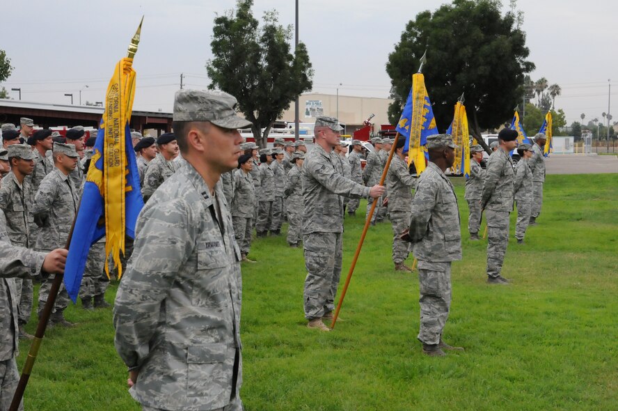 On Sept. 11, 2011 members of the 144th Mission Support Group, 144th Fighter Wing, California Air National Guard, Fresno, Calif., took part in the Change of Command ceremony where Col. David Bandini relinquished command to Lt. Col Gary Kellogg. The ceremony places importance on the visual aspects so that all under the command know who the new commander is. (U.S. Air Force photo by Master Sgt. David Loeffler)