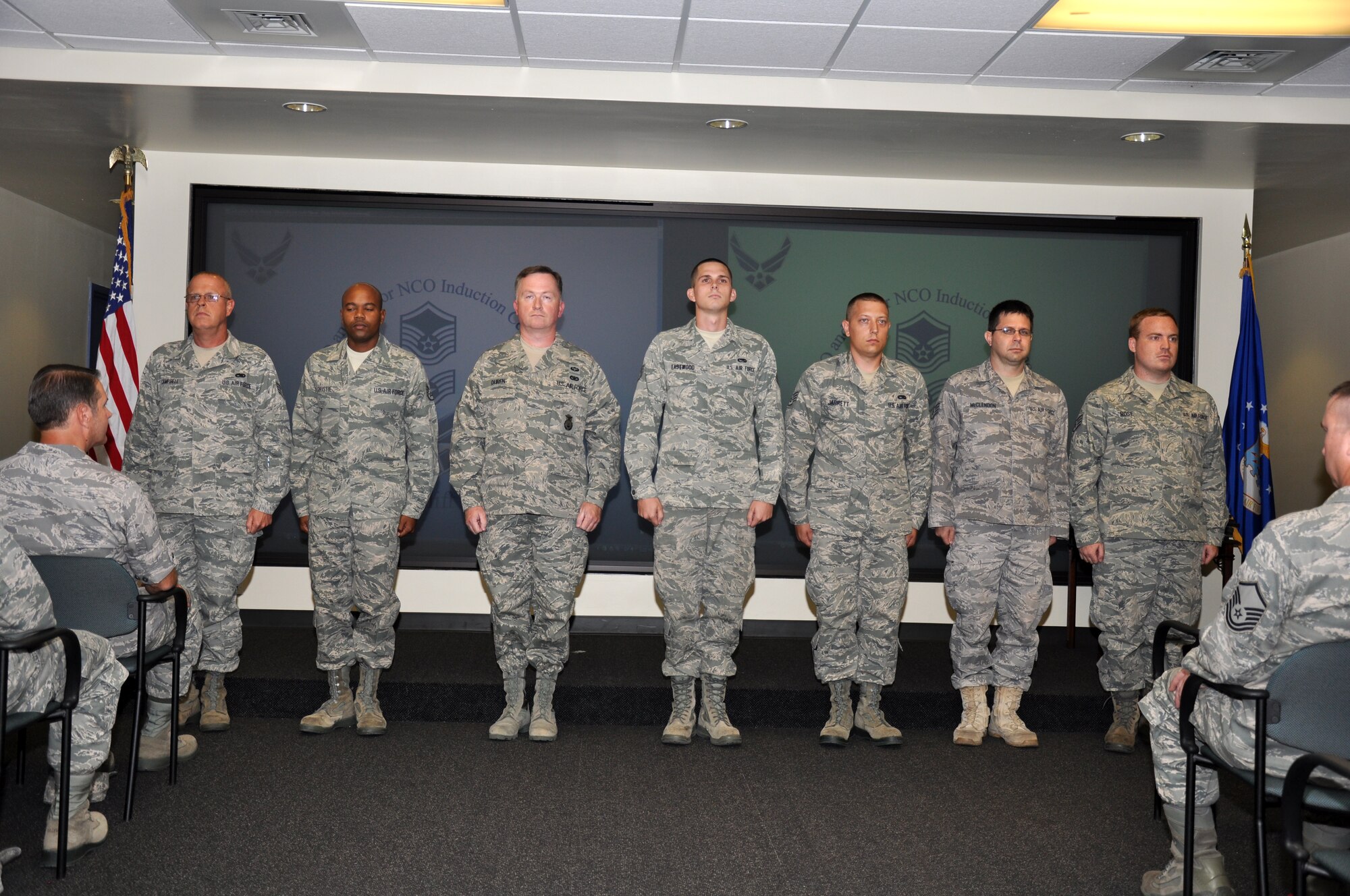 Seven Airmen from the 315th Airlift Wing at Joint Base Charleston, S.C. are inducted into the noncommissioned officers corps Sept. 10, 2011. (U.S. Air Force photo\Staff Sgt. Shane Ellis)
