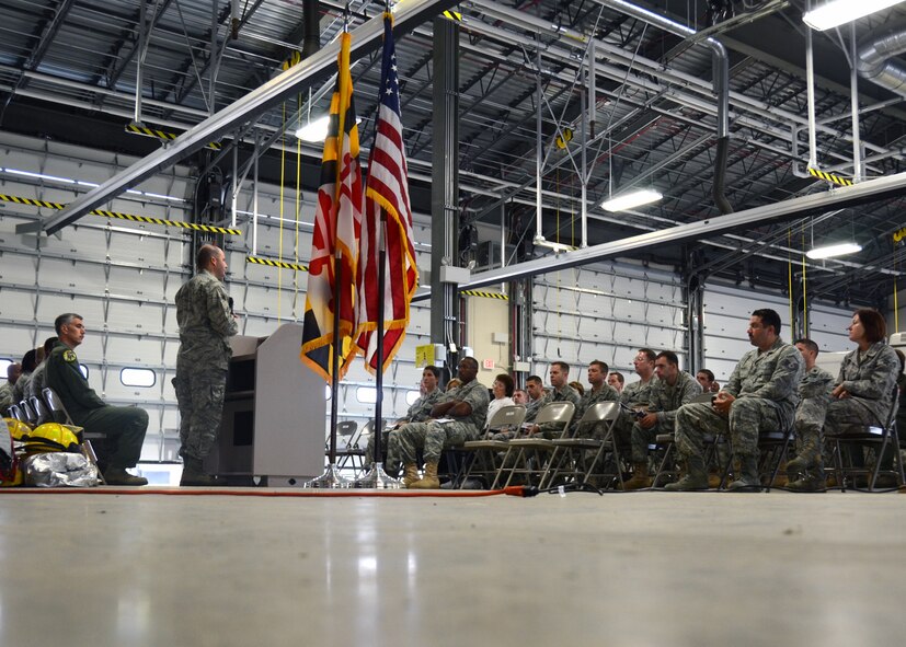 U.S. Air Force First Lieutenant Jesse Bolger, 175th Chaplain, reflects upon the events of September 11, 2001 during a ten year anniversary memorial service honoring the victims and those affected by the events of September 11, 2001.  The 175th Wing chaplains hosted a ten year anniversary memorial service on September 11, 2011 at Warfield Air National Guard Base, Baltimore, MD.  (U.S. Air Force photo by Staff Sgt. Benjamin Hughes/RELEASED)