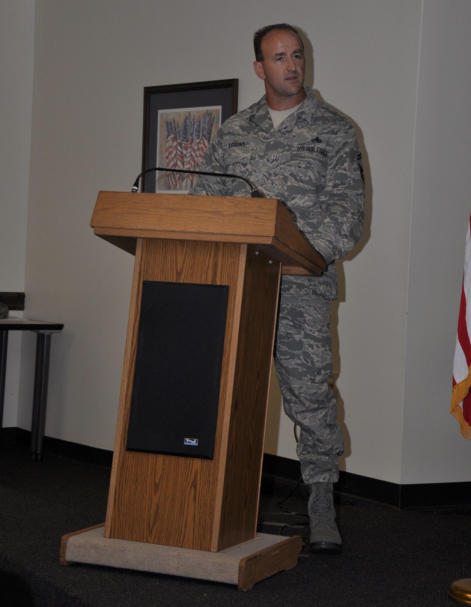 Senior Master Sgt. Berry Sessions speaks to members of the 315th Airlift Wing at Joint Base Charleston, S.C. Sept. 10, 2011 during the noncommissioned officer corps and the senior noncommissioned officer corps inductions ceremony. Sergeant Berry is the 315th Aircraft Maintenance Squadron flight chief. (U.S. Air Force photo\Staff Sgt. Shane Ellis)