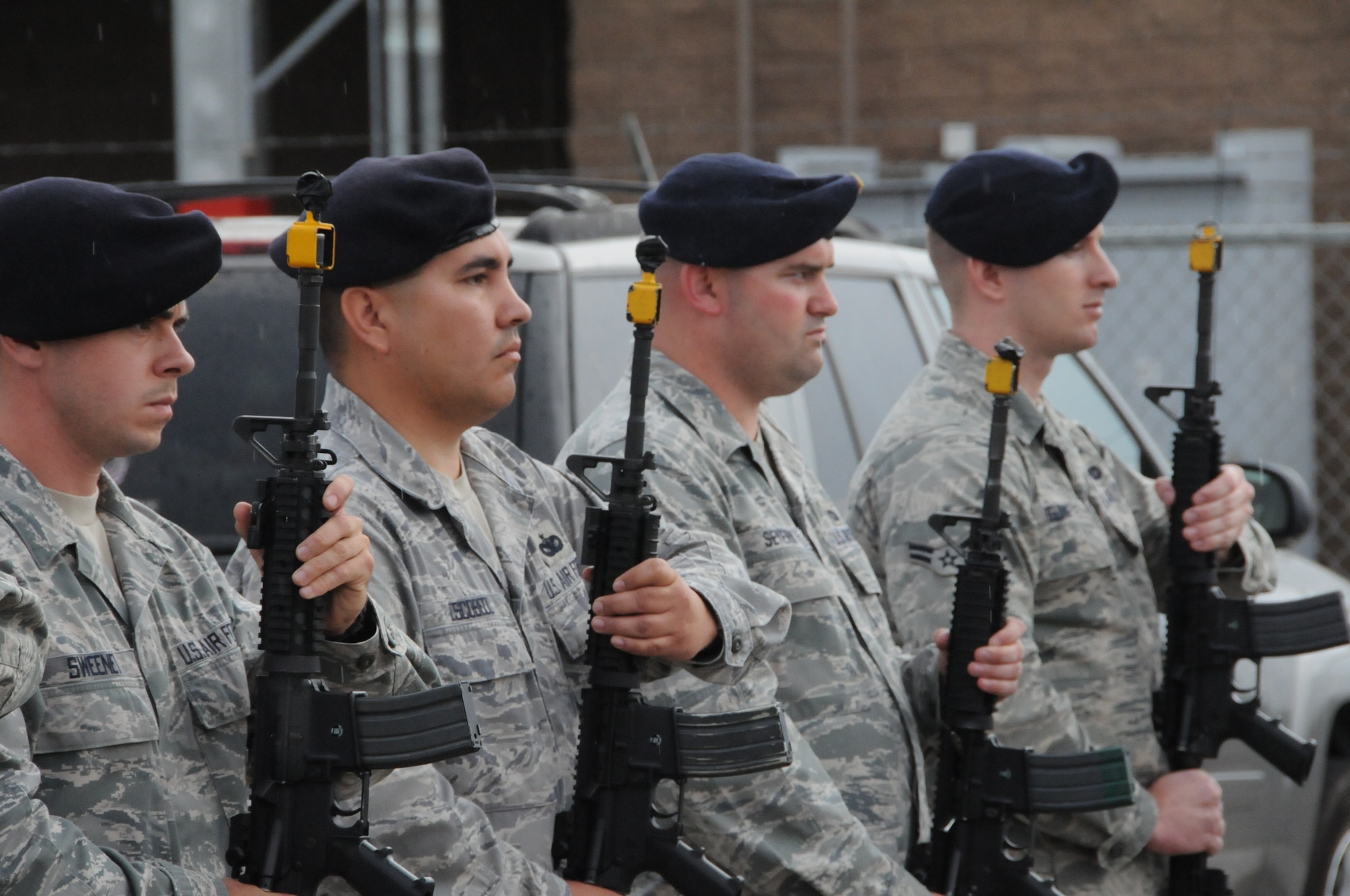 Members of the 144th Security Forces Squadron, 144 Fighter Wing, California Air National Guard, Fresno Calif., prepare to perform a 21 gun salute to honor those who served, perished and paid the ultimate sacrifice during a remembrance ceremony on Sept. 11, 2011. The ceremony included time to ponder our great losses, an invocation from the base chaplain, a 21 gun salute and a display of military and civilian emergency vehicles. (U.S. Air Force photo by MSgt David Loeffler)