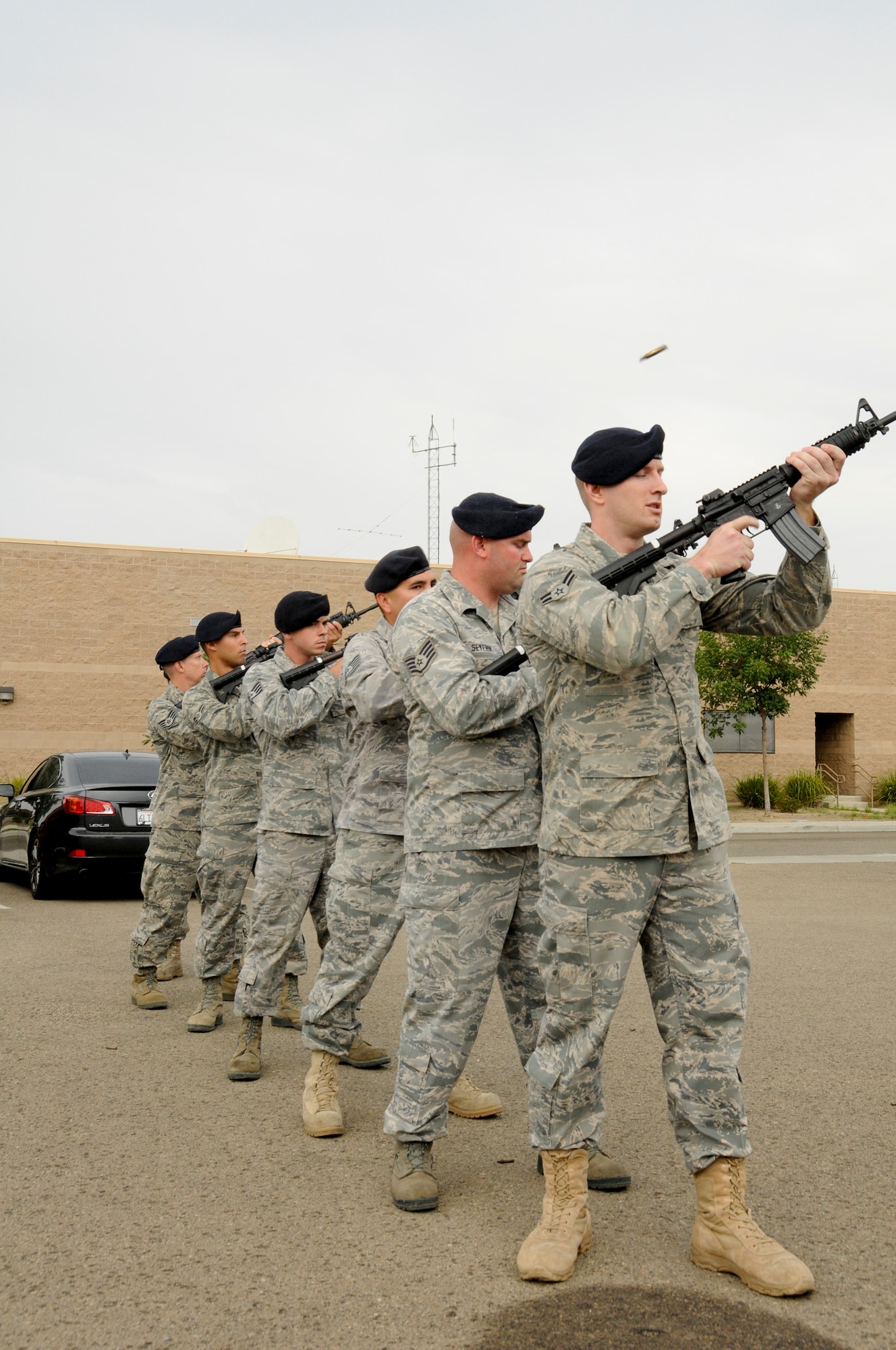 Members of the 144th Security Forces Squadron, 144 Fighter Wing, California Air National Guard, Fresno Calif., perform a 21 gun salute to honor those who served, perished and paid the ultimate sacrifice, Sept. 11, 2011. The ceremony included time to ponder our great losses, an invocation from the base chaplain, a 21 gun salute and a display of military and civilian emergency vehicles. (U.S. Air Force photo by Tech. Sgt. Robin Meredith)
