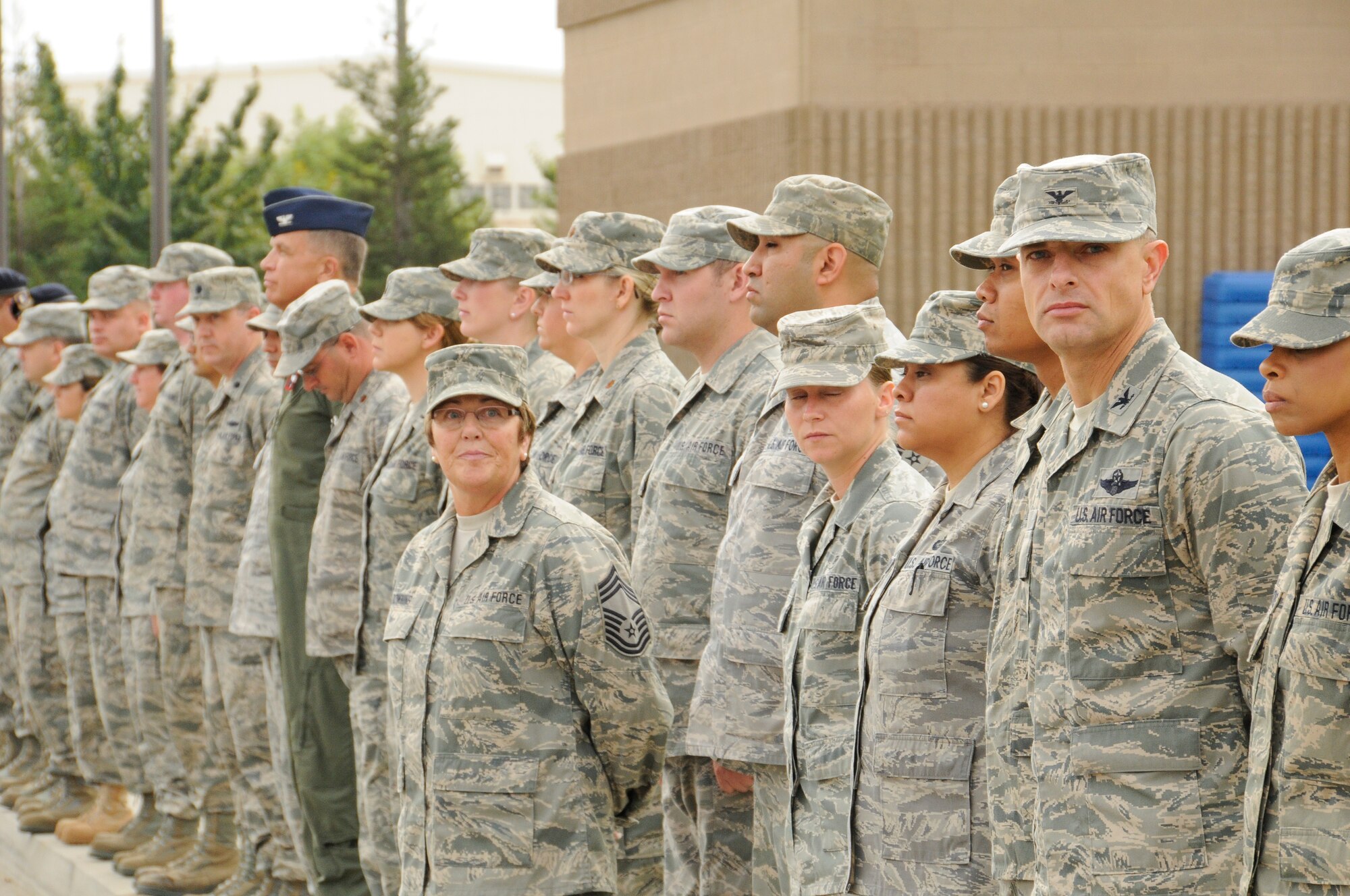 Col. Sami Said, Commander of the 144th Fighter Wing, California Air National Guard, Fresno Calif., pauses to honor those who served, perished and paid the ultimate sacrifice during a ceremony Sept. 11, 2011. The ceremony included time to ponder our great losses, an invocation from the base chaplain, a 21 gun salute and a display of military and civilian emergency vehicles. (U.S. Air Force photo by Tech. Sgt Robin D. Meredith)