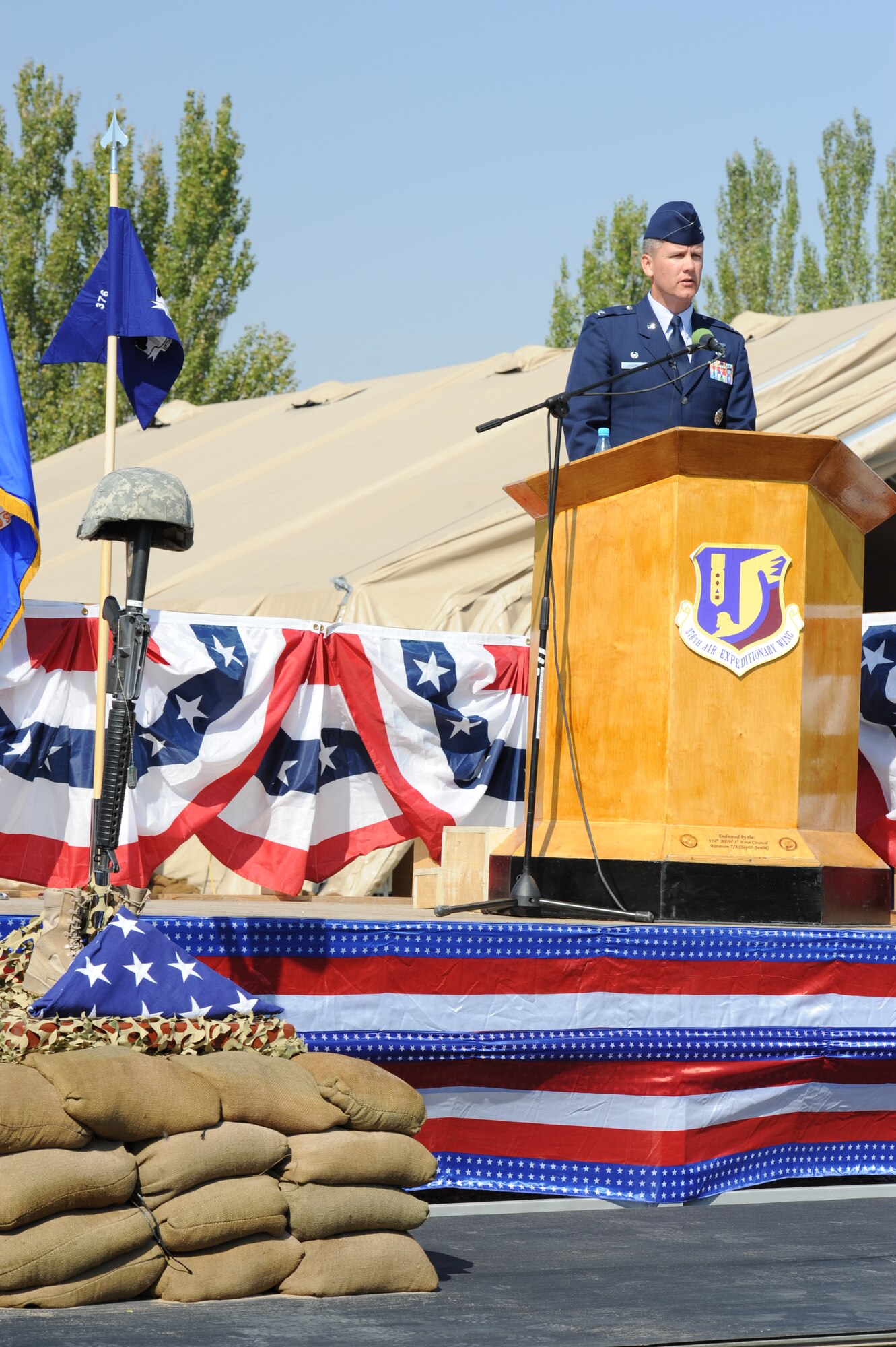 Col. James Jacobson, 376th Air Expeditionary Wing commander, speaks during the 9/11 Remembrance Ceremony at the Transit Center at Manas, Kyrgyzstan, Sept. 11.  Several U.S. and Kyrgyz Republic distinguished visitors, including Kyrgyz Republic President Roza Otunbayeva, attended the ceremony. (U.S. Air Force photo/Tech. Sgt. Hank Hoegen) 