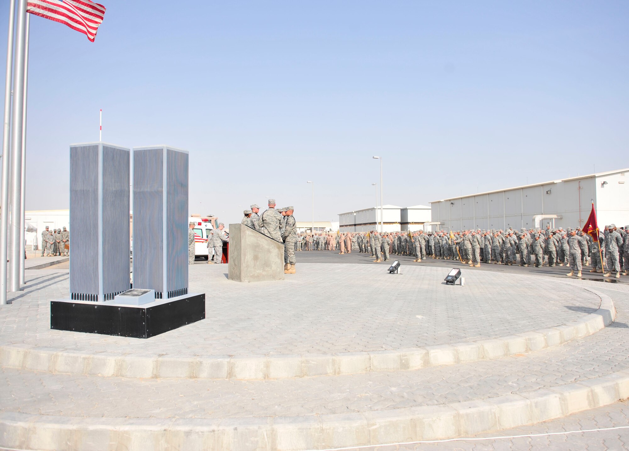 The Airmen of the 380th Air Expeditionary Wing and its mission partners honored the 10th anniversary of Sept. 11, 2001, remembering those who perished at the World Trade Center, the Pentagon, in Shanksville, Penn., and those who have given their lives in the name of freedom in the 10 years since the attacks, at a ceremony Sept. 11, 2011, at the wing 9/11 memorial. The event began at 8:46 a.m., the exact time of the first attack.  (U.S. Air Force photo/Tech Sgt. Patrick Mitchell)