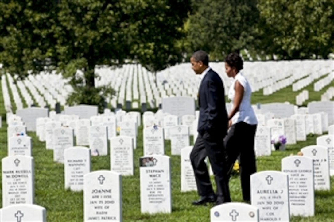 President Barack Obama and First Lady Michelle Obama visit Section 60 of Arlington National Cemetery in Arlington, Va., Sept. 10, 2011. Section 60 is reserved for military personnel who have lost their lives while fighting in Afghanistan and Iraq.