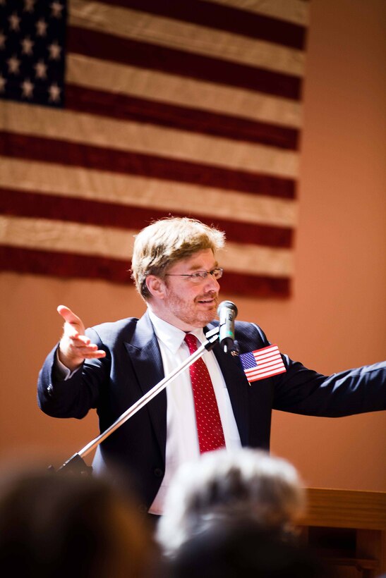 David Huebner, U.S. Ambassador to New Zealand, speaks at a community outreach concert by the U.S. Marine Corps Forces, Pacific Band, at the Stratford War Memorial Centre here Sept 13. The MarForPac Band is in New Zealand to kick off a yearlong celebration for the 70th anniversary of Marines landing in Wellington in 1942. (Official U.S. Marine Corps photo by Lance Cpl. Isis M. Ramirez)