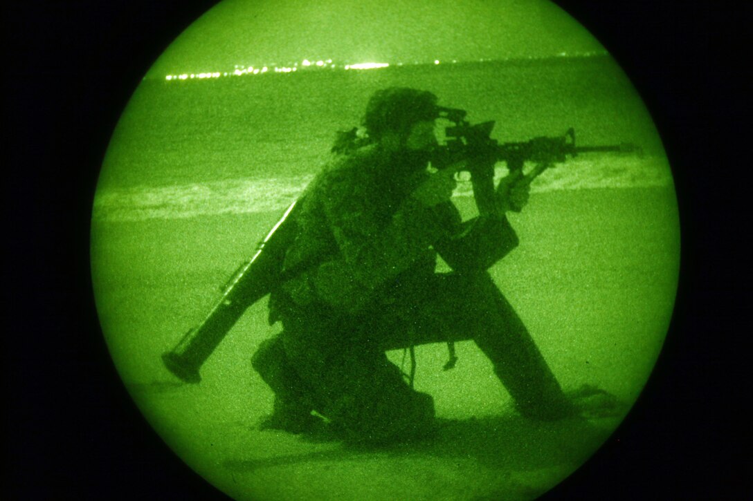 A Marine with Company F, Battalion Landing Team 2nd Battalion, 7th Marines, 31st Marine Expeditionary Unit, provides security during a mock small-boat amphibious raid, Sept. 12. The raid was conducted to eliminate insurgents, destroy military equipment being stores by the enemy in the area and to turn the area over to local national police to ensure the enemy does not reestablish itself in the area. The 31st MEU is the only continuously forward-deployed MEU and remains the nation’s force in readiness in the Asia-Pacific region.