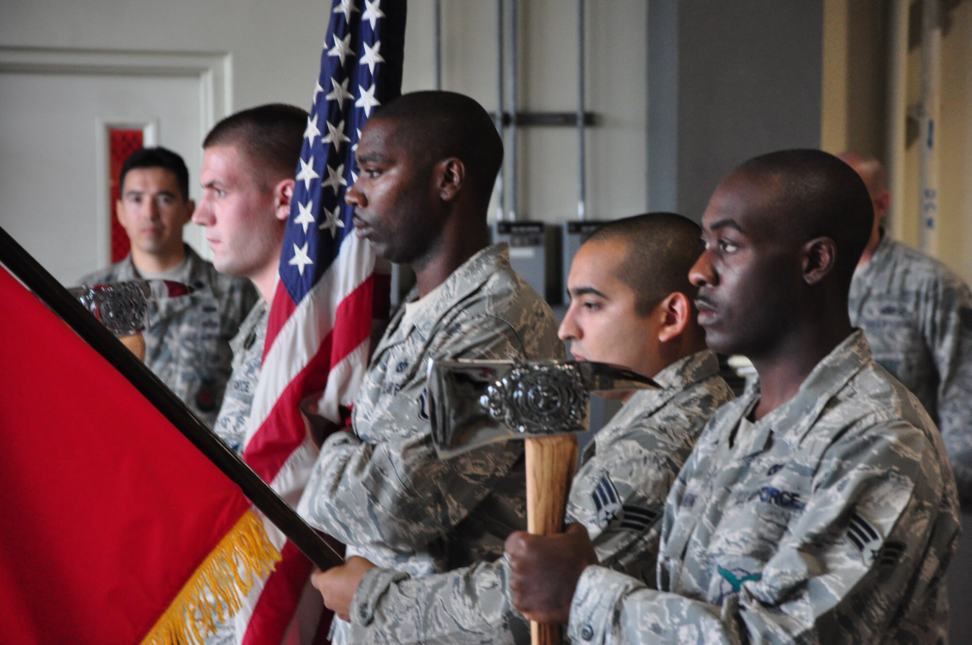 The 51st Civil Engineer Squadron fire department honor guard presents the colors Sept. 11, 2011 at Osan Air Base, Republic of Korea. “We will never forget,” is a phrase many Americans have heard thousands of times since Sept. 11, 2001, but for some the words go a bit deeper. The 51st CES fire department held a ceremony to remember and honor the firefighters who lost their lives that fateful day. (U.S. Air Force photo/Tech. Sgt. Chad Thompson)