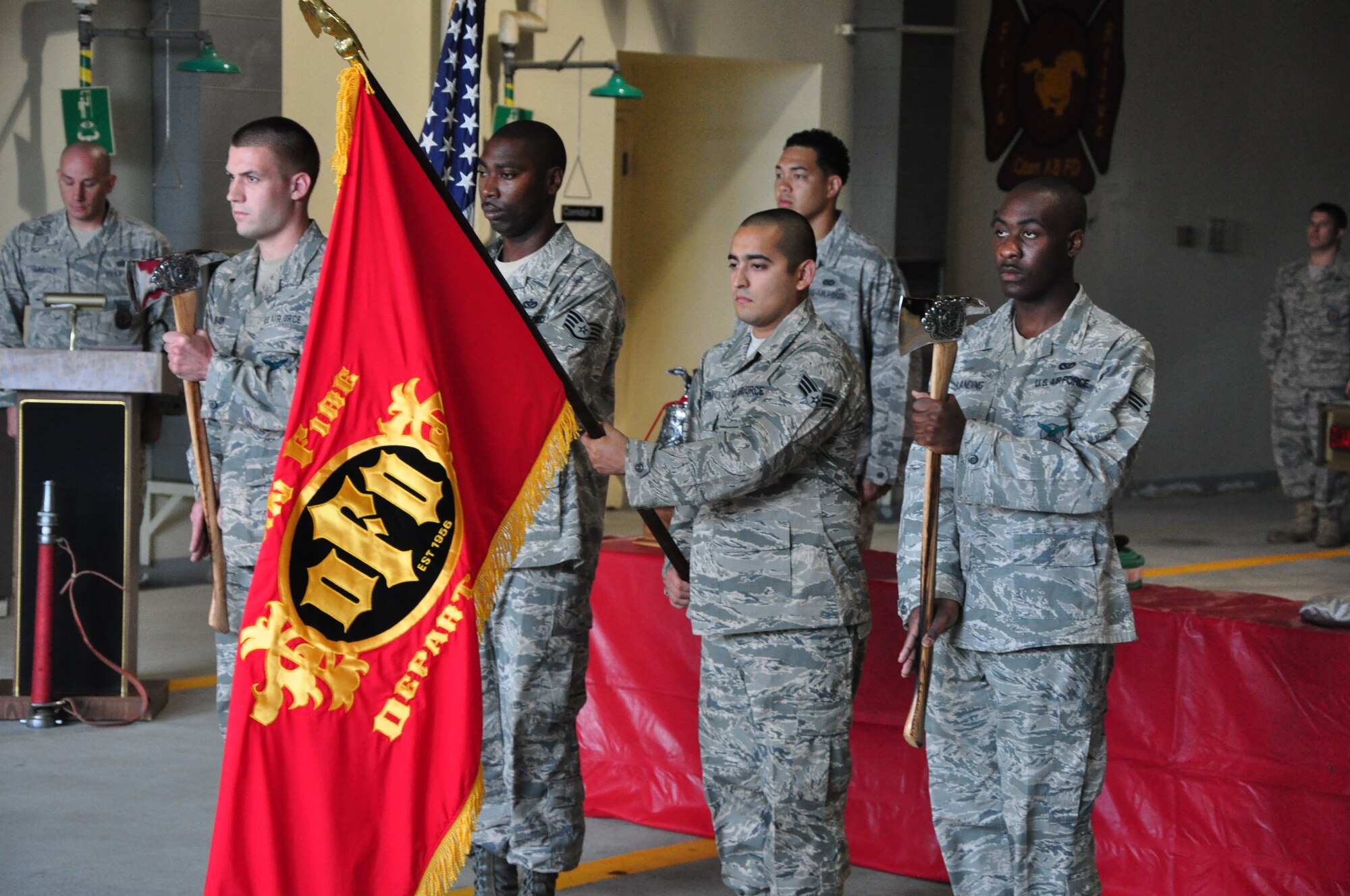 The 51st Civil Engineer Squadron fire department honor guard presents the colors Sept. 11, 2011 at Osan Air Base, Republic of Korea. “We will never forget,” is a phrase many Americans have heard thousands of times since Sept. 11, 2001, but for some the words go a bit deeper. The 51st CES fire department held a ceremony to remember and honor the firefighters who lost their lives that fateful day. (U.S. Air Force photo/Tech. Sgt. Chad Thompson)