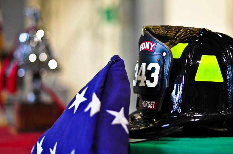 “We will never forget,” is a phrase many Americans have heard thousands of times since Sept. 11, 2001, but for some the words go a bit deeper. The 51st Civil Engineer Squadron fire department held a ceremony here Sept. 11, 2011, to remember and honor the firefighters who lost their lives that fateful day. (U.S. Air Force photo/Tech. Sgt. Chad Thompson)