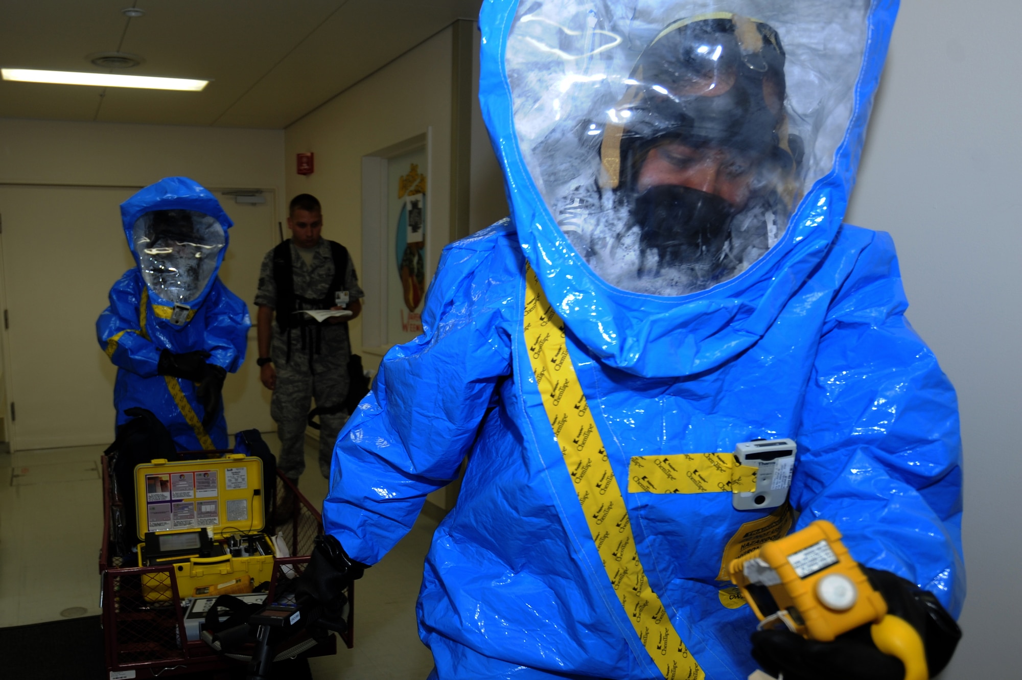 MISAWA AIR BASE, Japan -- Tech. Sgt. Makeisha LaPlante, 35th Aerospace Medicine Squadron, watches the indicator as she scans the area for possible bio hazard at building 99 during an exercise Sept 12.  This training helps ready and prepare today's Airmen for any event that may occur. (U.S. Air Force Photo/ Staff Sgt. April Quintanilla)