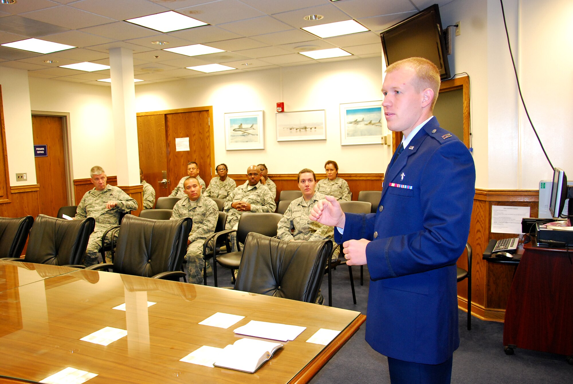 JOINT BASE ANDREWS, Md. -- Capt. Matthew Smith, 459th Air Refueling Wing chaplain, provides a sermon during a Sept. 11 remembrance service here. The September Reserve weekend also marked the tenth of anniversary of Sept. 11. Throughout the weekend, Airmen paid tribute to those who lost their lives during the tragic events by sharing stories and attending the chaplain's service on Sunday. (U.S. Air Force photo/Senior Airman Amber Russell)