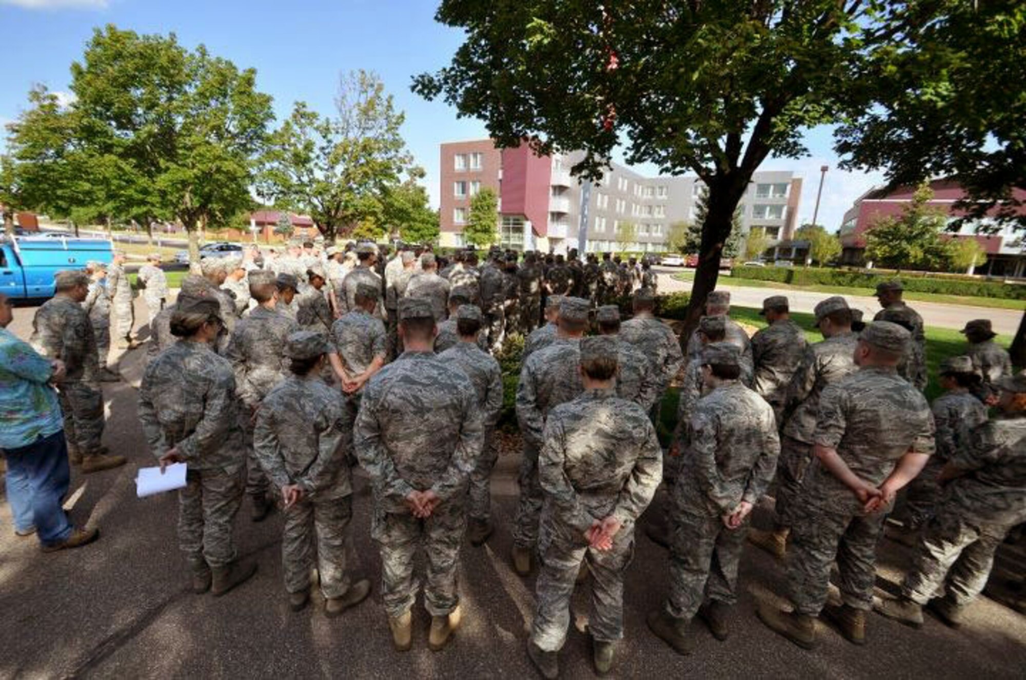 Members of the 934th Airlift Wing, Minneapolis ARS Minnesota, take a moment to reflect on the events of September 11th 2001. A small remembrance ceremony was held outside the headquarters building Sunday morning. Minneapolis ARS MN. (Air Force Photo/TSgt Bob Sommer)