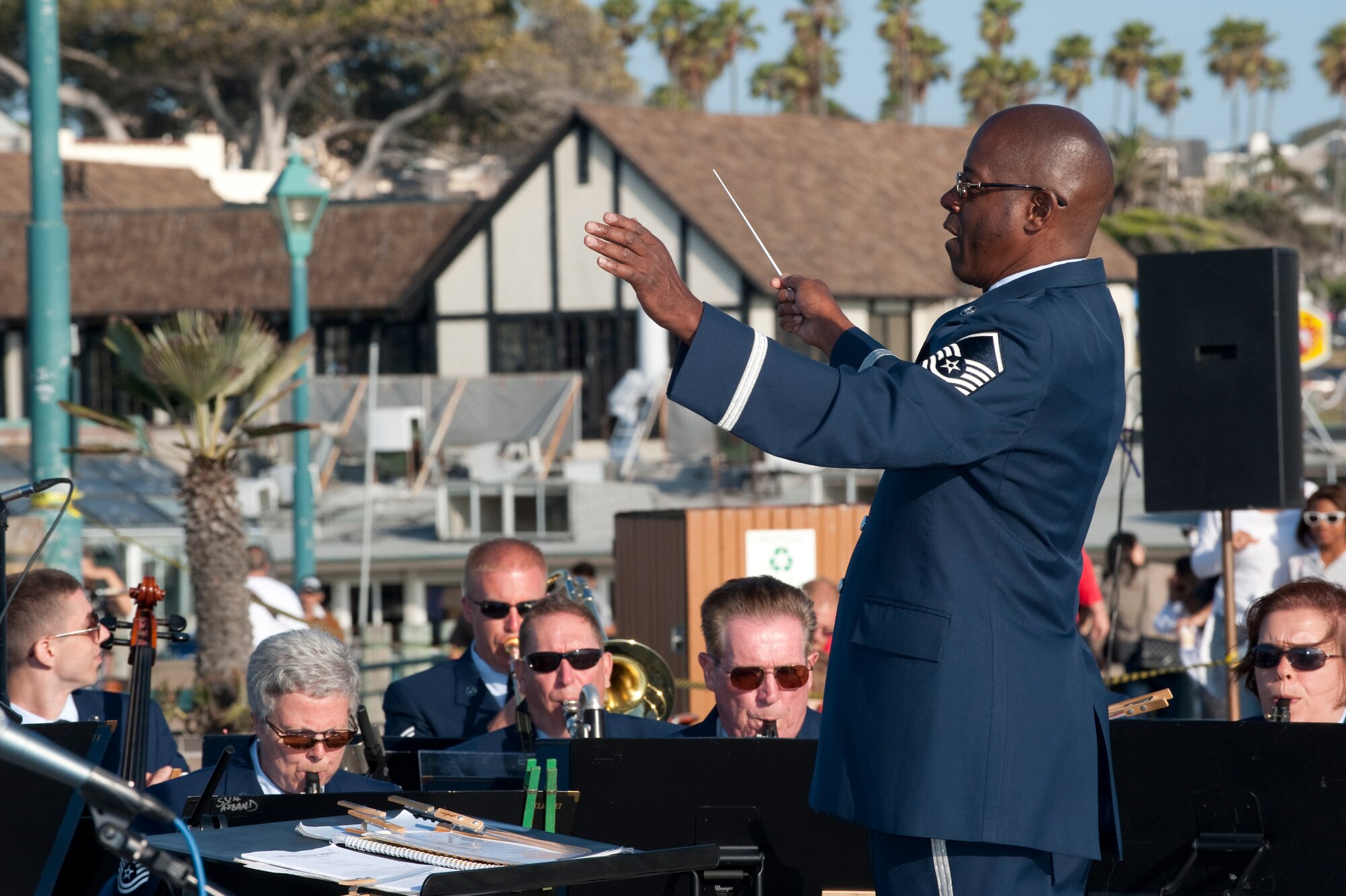 MSgt Gregory Robinson, Associate Conductor for the Air National Guard Band of the Southwest, conducts the final outdoor concert of the Southwrn Califonia Tour in Redondo Beach California. 16 July 2010 

Photo by TSgt Chuck Hatton