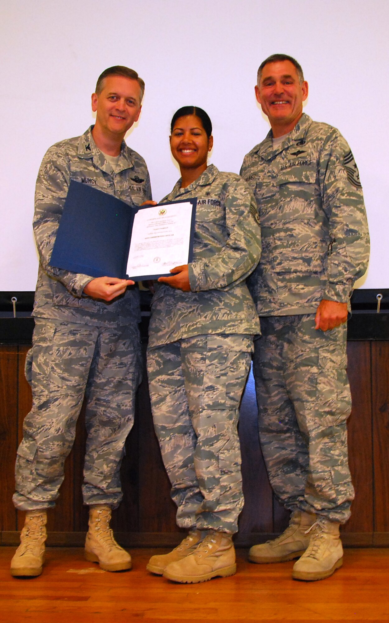 JOINT BASE ANDREWS, Md. -- The 459th Air Refueling Wing held its second Non-comissioned officer and Senior Non-commissioned officer induction ceremony of 2011 in the Wing Auditorium here, Sept. 11, 2011. The induction ceremonies are sponsored by the wing's Top 3 organization and will be held at multiple times throughout the year for Airmen who have made the NCO and SNCO ranks. (U.S. Air Force photo/SrA Amber Russell)