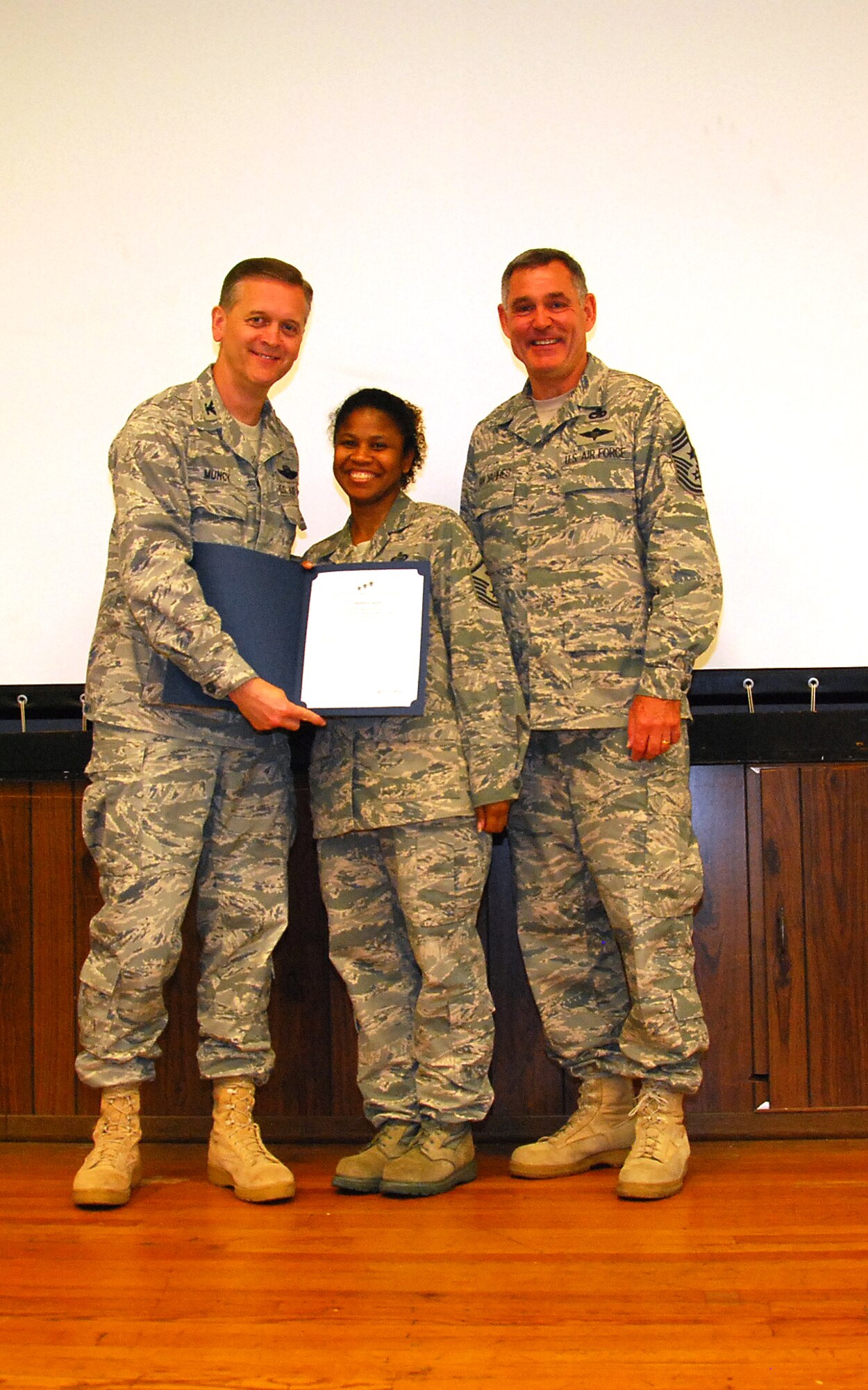 JOINT BASE ANDREWS, Md. -- The 459th Air Refueling Wing held its second Non-comissioned officer and Senior Non-commissioned officer induction ceremony of 2011 in the Wing Auditorium here, Sept. 11, 2011. The induction ceremonies are sponsored by the wing's Top 3 organization and will be held at multiple times throughout the year for Airmen who have made the NCO and SNCO ranks. (U.S. Air Force photo/SrA Amber Russell)