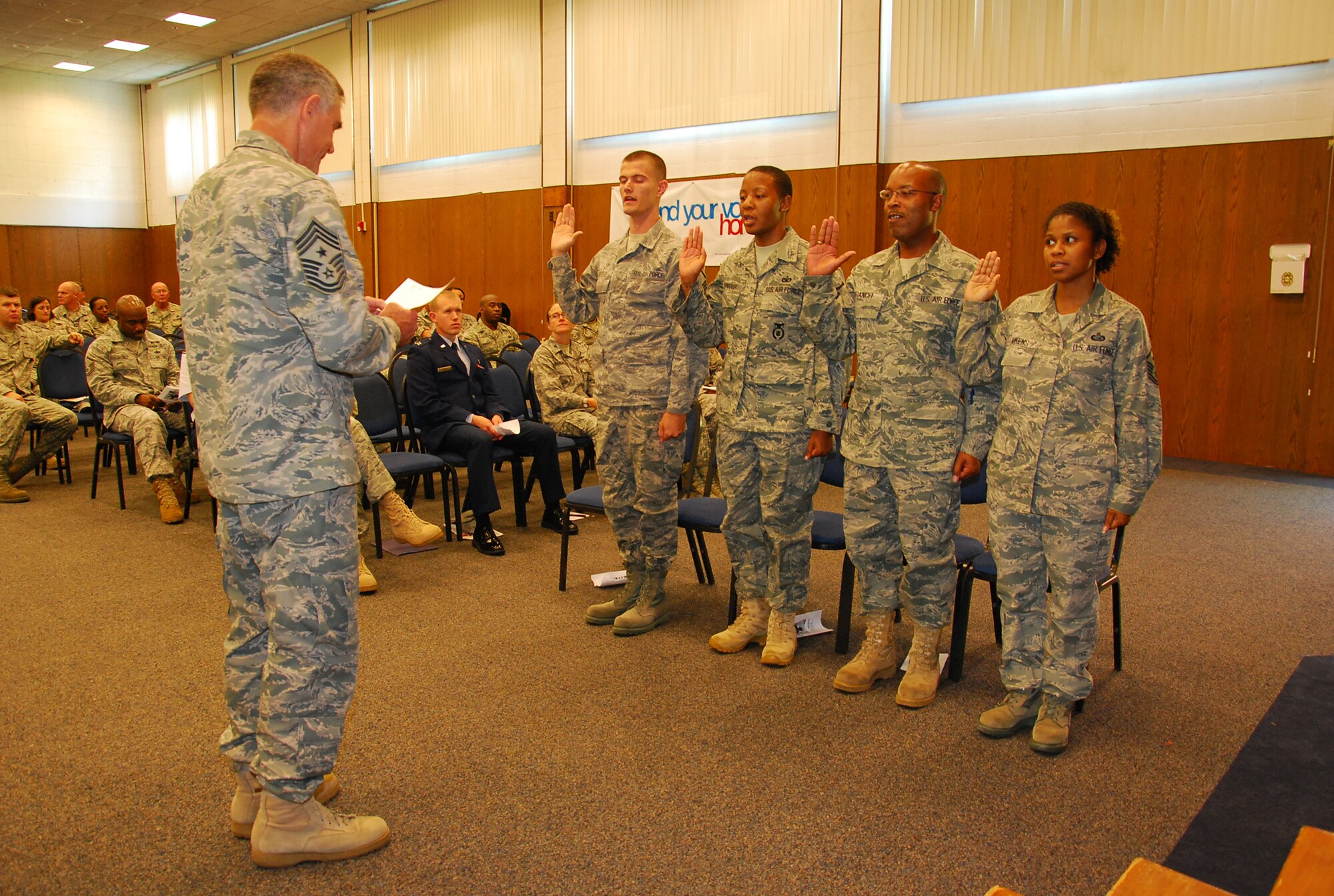 JOINT BASE ANDREWS, Md. -- The 459th Air Refueling Wing held its second Non-comissioned officer and Senior Non-commissioned officer induction ceremony of 2011 in the Wing Auditorium here, Sept. 11, 2011. The induction ceremonies are sponsored by the wing's Top 3 organization and will be held at multiple times throughout the year for Airmen who have made the NCO and SNCO ranks. (U.S. Air Force photo/SrA Amber Russell)