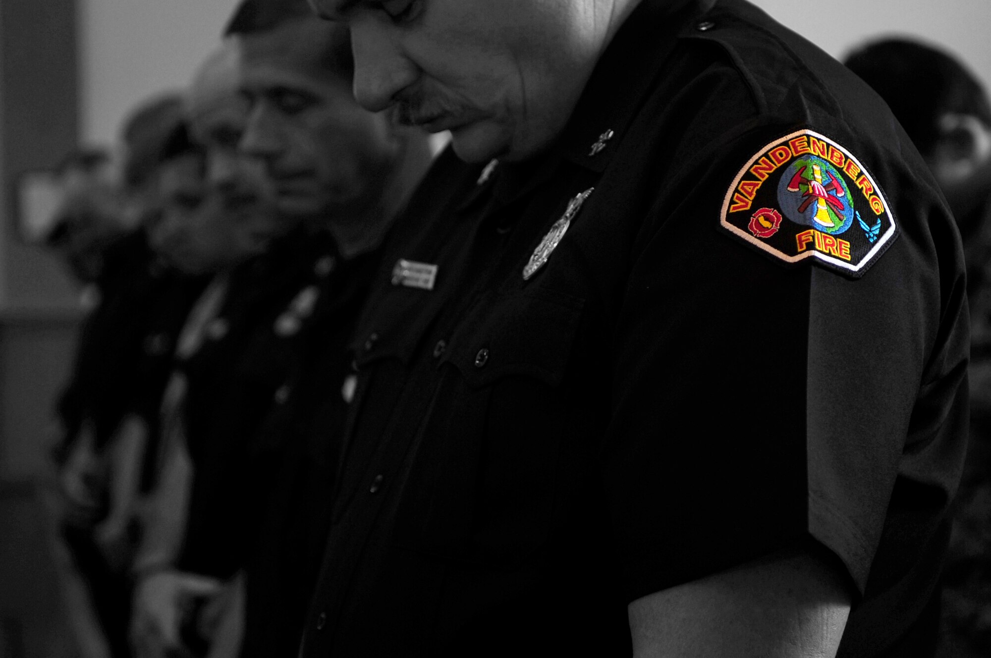 VANDENBERG AIR FORCE BASE, Calif. – Members of the Vandenberg Fire Department attended a 9/11 Memorial Ceremony at Chapel 1 here Monday, Sept. 12, 2011. The ceremony was in remembrance of the victims the 9/11 terrorist attacks.  (U.S. Air Force photo/Senior Airman Lael Huss)