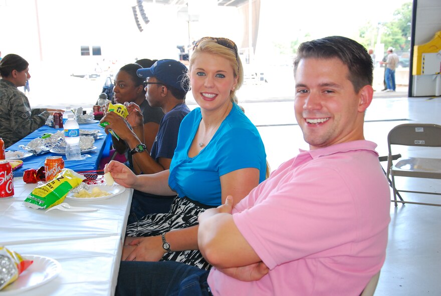 JOINT BASE ANDREWS, Md. -- The 459th Air Refueling Wing held its annual Family Fun Day at the fuel cell hangar here, Sept. 10. A barbecue and fun-filled events took place such as, face painting, dunking booth contests and a live performance from country music artist and former American Idol contestant Bucky Covington. (U.S. Air Force photo/Senior Airman Amber Russell)   
