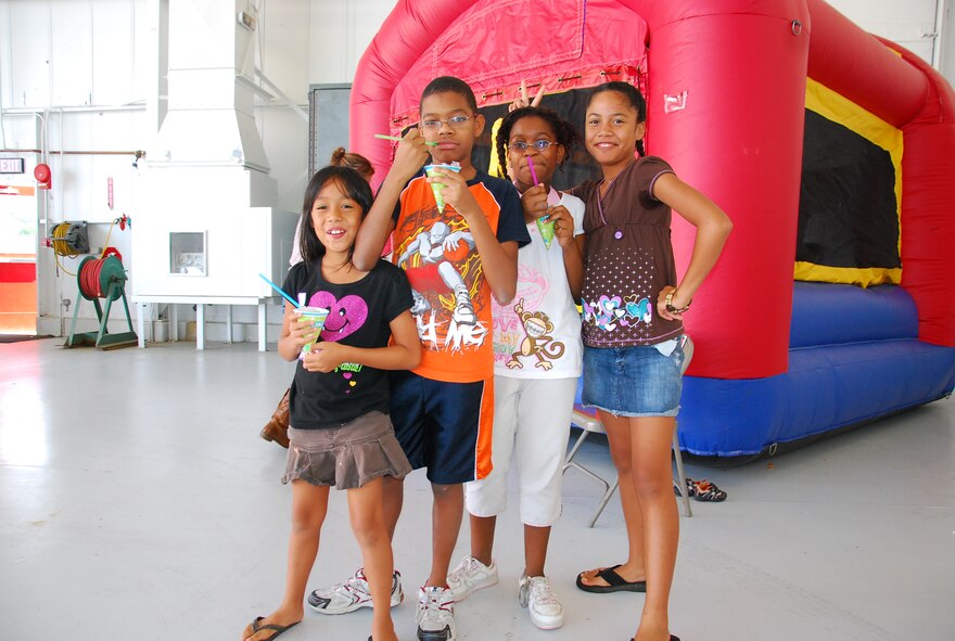 JOINT BASE ANDREWS, Md. -- The 459th Air Refueling Wing held its annual Family Fun Day at the fuel cell hangar here, Sept. 10. A barbecue and fun-filled events took place such as, face painting, dunking booth contests and a live performance from country music artist and former American Idol contestant Bucky Covington. (U.S. Air Force photo/Senior Airman Amber Russell)   