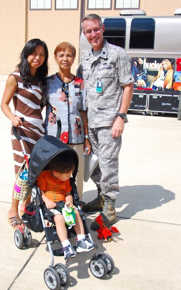 JOINT BASE ANDREWS, Md. -- The 459th Air Refueling Wing held its annual Family Fun Day at the fuel cell hangar here, Sept. 10. A barbecue and fun-filled events took place such as, face painting, dunking booth contests and a live performance from country music artist and former American Idol contestant Bucky Covington. (U.S. Air Force photo/Senior Airman Amber Russell)   