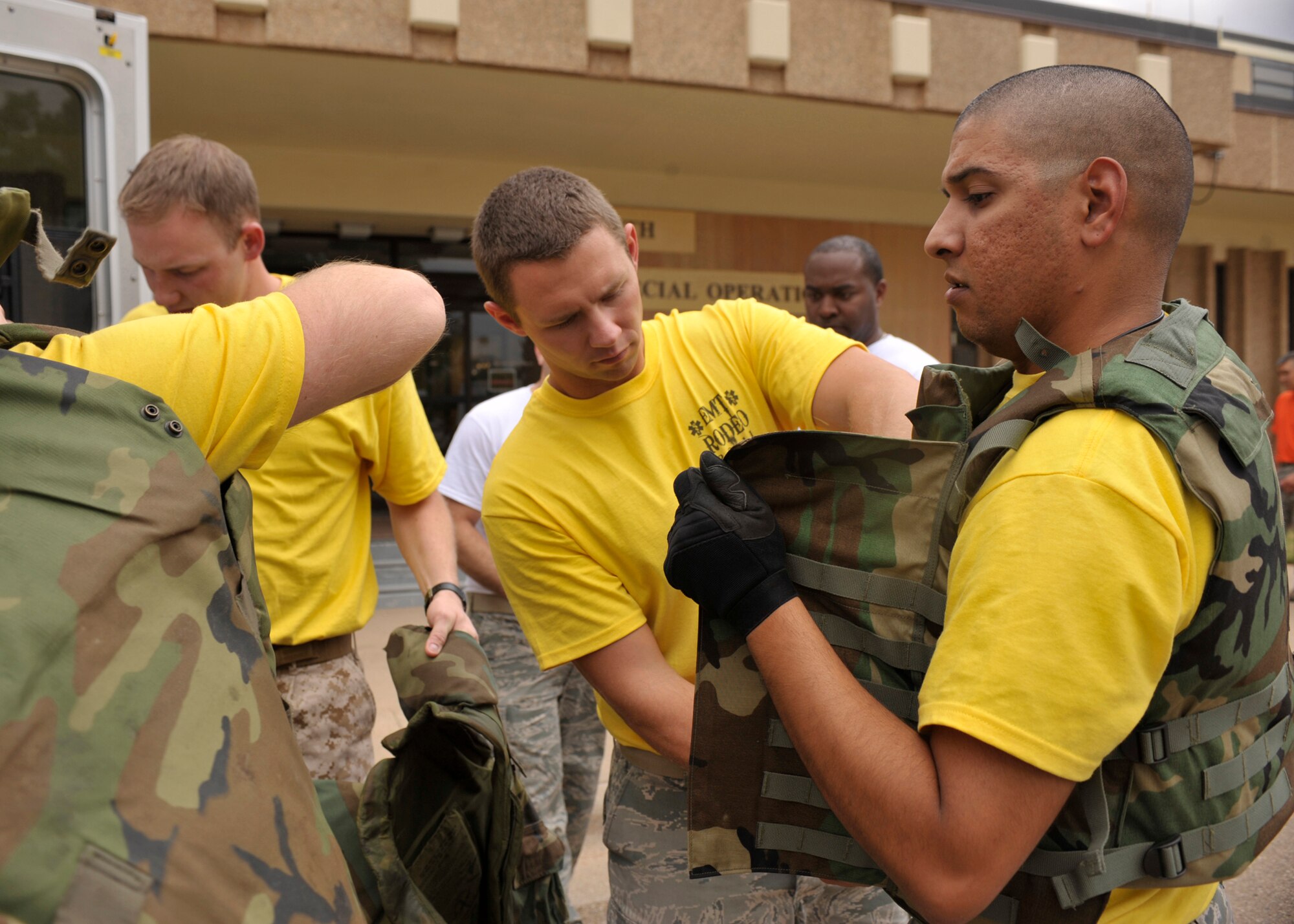 The emergency medical team from Fort Sam/Huston, Texas., crawls through an obstacle course as part of the Emergency Medical Technician Rodeo at Cannon Air Force Base, N.M., Sept. 10, 2011. The EMT Rodeo is a competition in which EMT teams from across the United States and Germany test their skills in various events that simulate real life scenarios. (U.S. Air Force photo by Airman 1st Class Ericka Engblom)