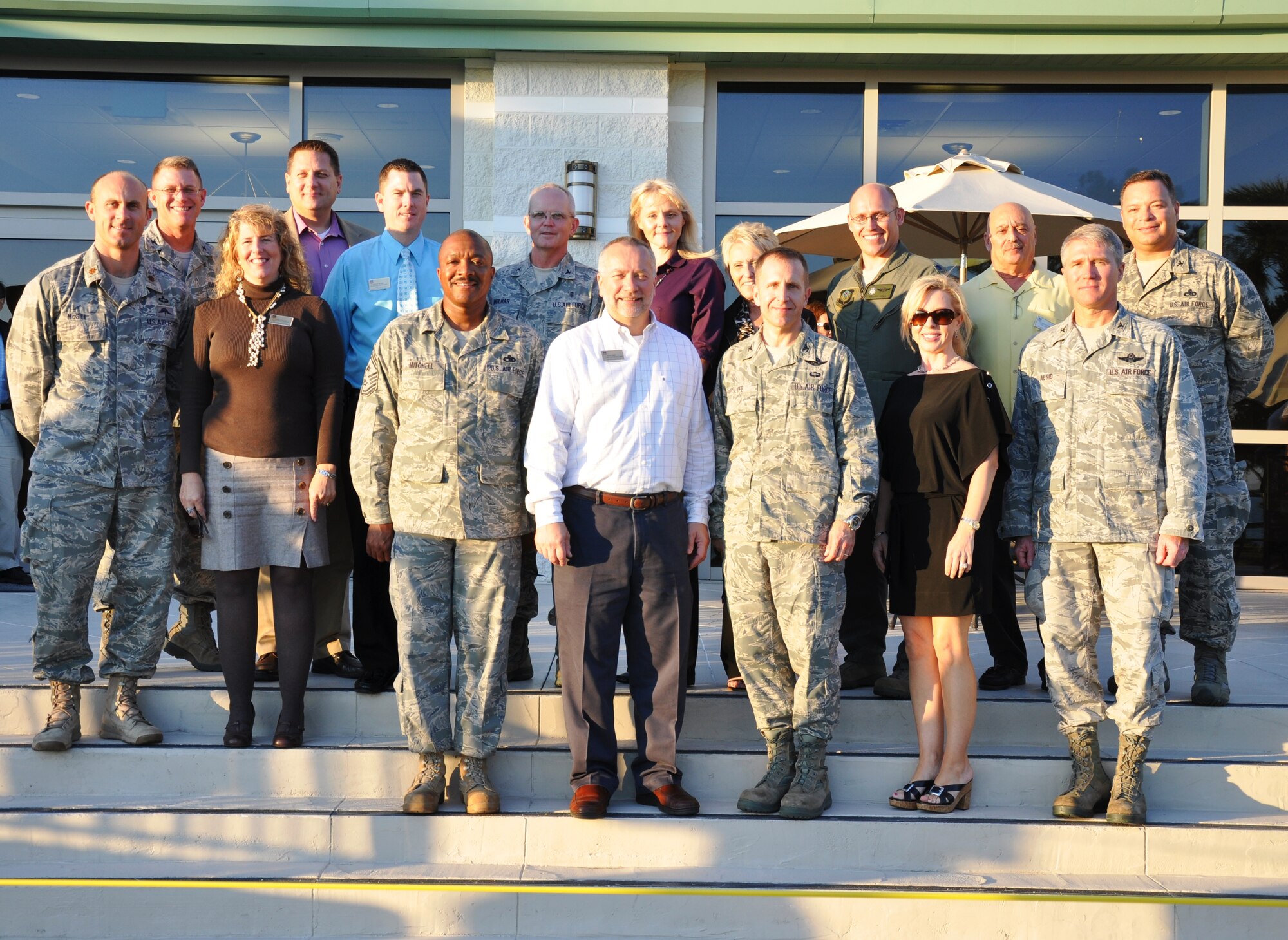 The 2011-2012 Hurlburt Field honorary commanders assumed command during a banquet at the Soundside Club at Hurlburt Field, Fla., Sept. 2, 2011. Here, the honorary commanders stand with their active-duty counterparts. (Front row, left to right) Chief Master Sgt. Dexter Mitchell, command chief of the 1st Special Operations Wing, James Curry, honorary commander of the 1st SOW, Col. James Slife, commander of the 1st SOW, Amy Perry, honorary commander of the Air Force Special Operations Training Center, and Col. Mark Alsid, commander of the AFSOTC. (Middle row, left to right) Maj. Mark McGill, commander of the 720th Operations Support Squadron, Marci Paulk, honorary commander of the 720th Special Tactics Group, Keith Wood, honorary command chief of the 1st SOW, Col. Troy Molnar, commander of the 1st Special Operations Medical Group, Amy Linares, honorary commander of the 1st SOMDG, Joie DeStefano, honorary commander of the 1st Special Operations Group, Lt. Col. Michael Grub, deputy commander of the 1st SOG, Dominic Damiano, honorary commander of the 1st Special Operations Maintenance Group, and Col. Robert Miglionico, commander of the 1st SOMXG. (Back row, left to right) Col. Curt Van de Walle, commander of the 1st Special Operations Mission Support Group, and Kenneth LaPee, honorary commander of the 1st SOMSG. (U.S. Air Force photo by U.S. Air Force Senior Airman Joe McFadden) 