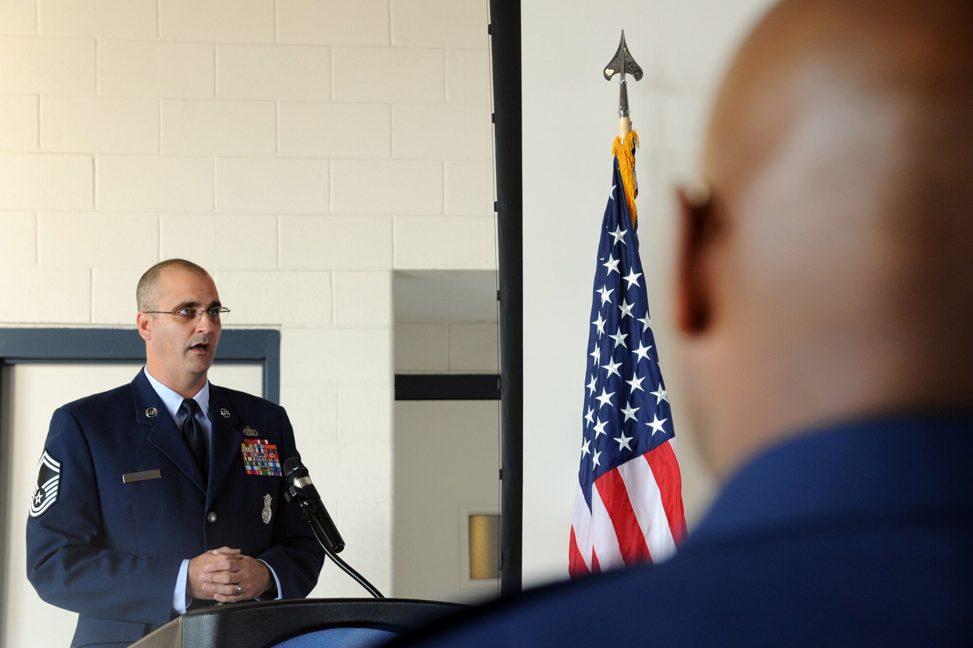 Senior Master Sgt. David Houtz tells a crowd the affect 9/11 had on him during a 9/11 remembrance ceremony on Seymour Johnson Air Force Base, N.C., Sept. 11, 2011. There were a total of 2,996 deaths, including the 19 hijackers from the attack on Sept. 11, 2001. Houtz is a 4th Security Forces Squadron operations superintendent and a native of Elizabeth City, N.C. (U.S. Air Force photo by Senior Airman Whitney Lambert)