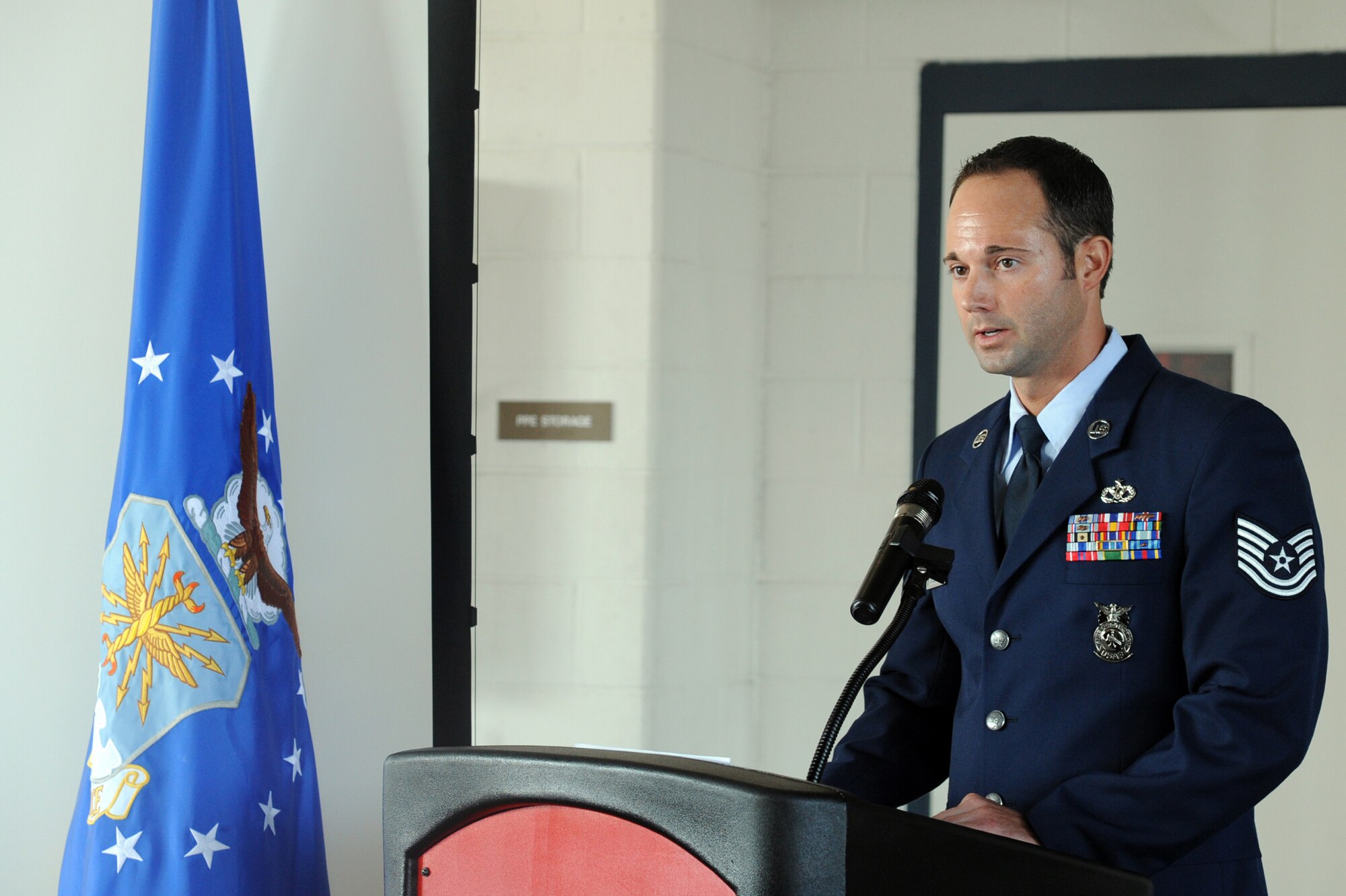 Tech. Sgt Bryan Driscoll participates as a master of ceremonies during a 9/11 remembrance ceremony on Seymour Johnson Air Force Base, N.C., Sept. 11, 2011. A total of 411 emergency workers who responded to the scene died trying to rescue people and fight fires. Driscoll participated in the ceremony to honor the fallen. Driscoll is a 4th Civil Engineer fire protection crew chief and a native of Cheyenne, Wy.  (U.S. Air Force photo by Senior Airman Whitney Lambert) 