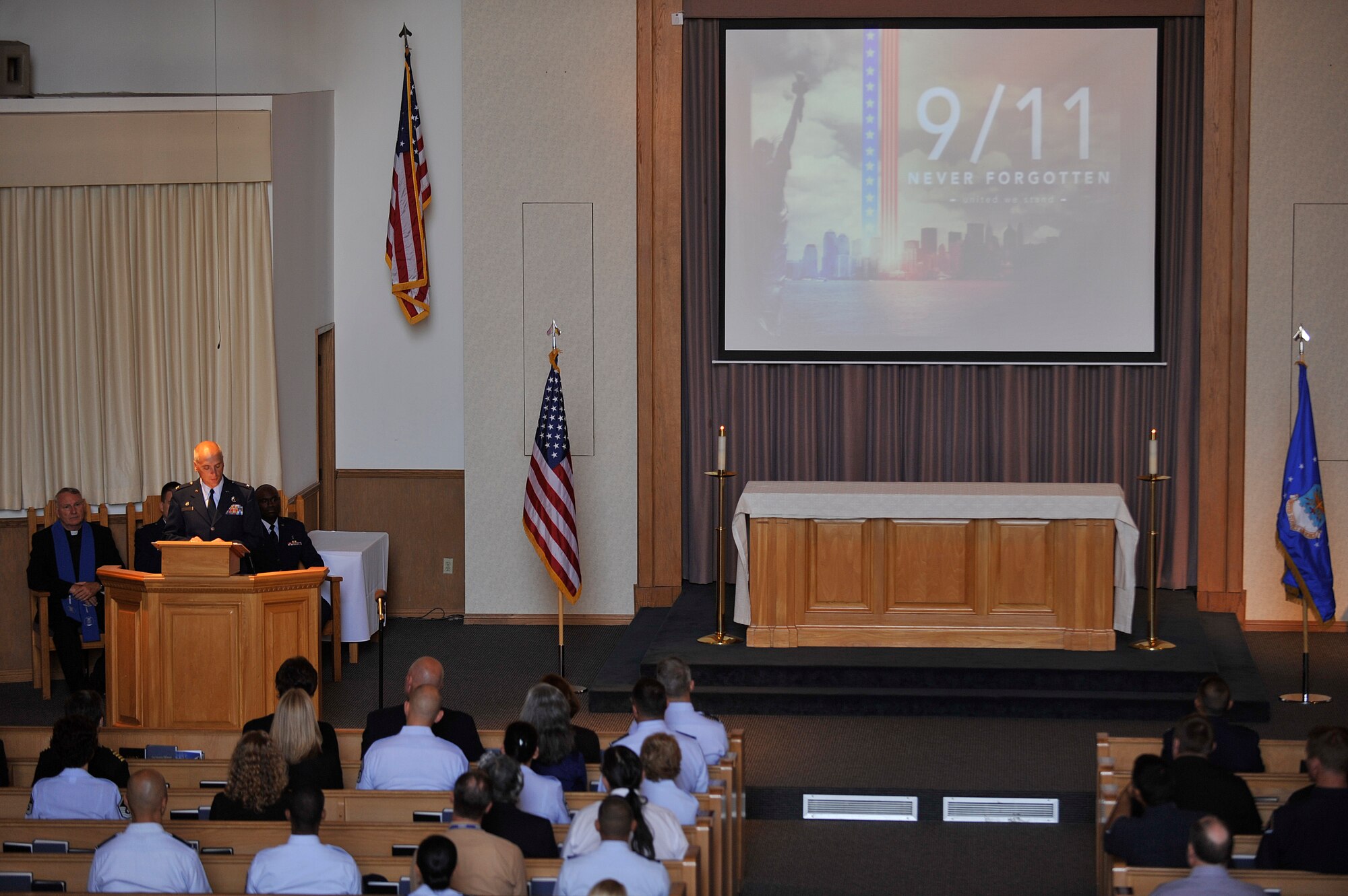 VANDENBERG AIR FORCE BASE, Calif. -- Col. Richard Boltz, 30th Space Wing commander, speaks during a 9/11 memorial ceremony at the base chapel here Monday, Sept. 11, 2011. The ceremony paid tribute to fallen heroes of the 9/11 attacks. (U.S. Air Force photo/Staff Sgt. Andrew Satran) 

  
 
